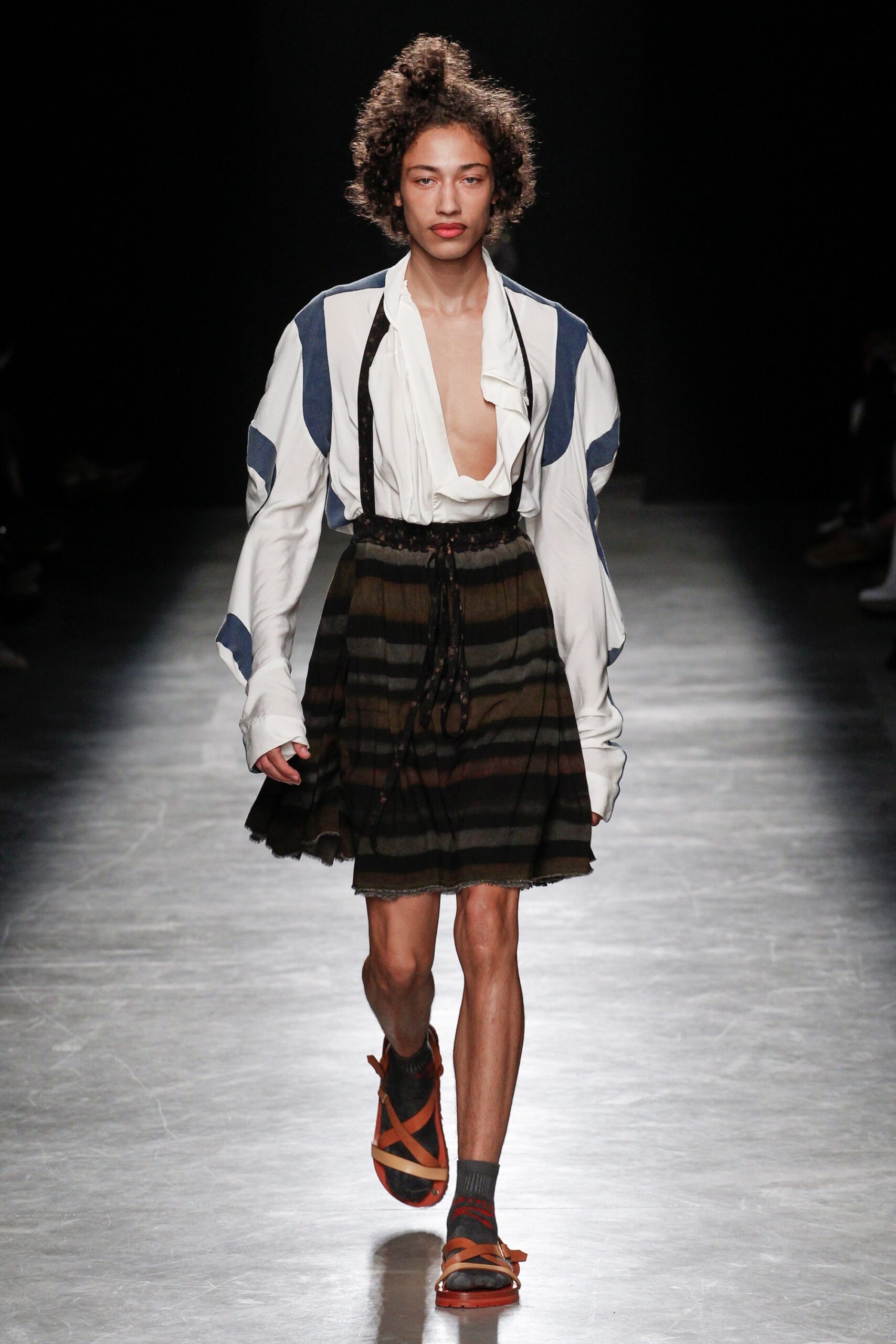 relaxed white shirt and pleated multi skirt