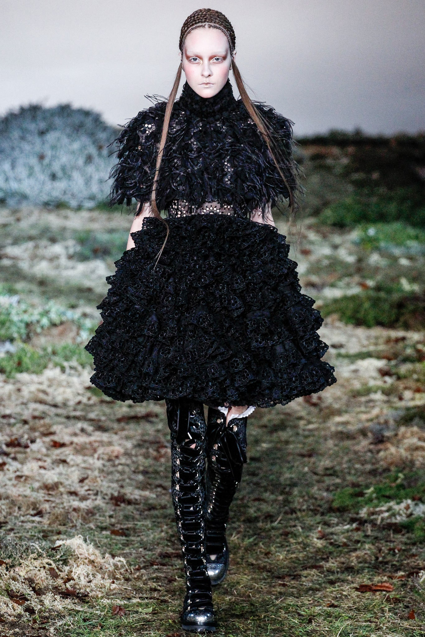 black leather fitted zippered shiny boots