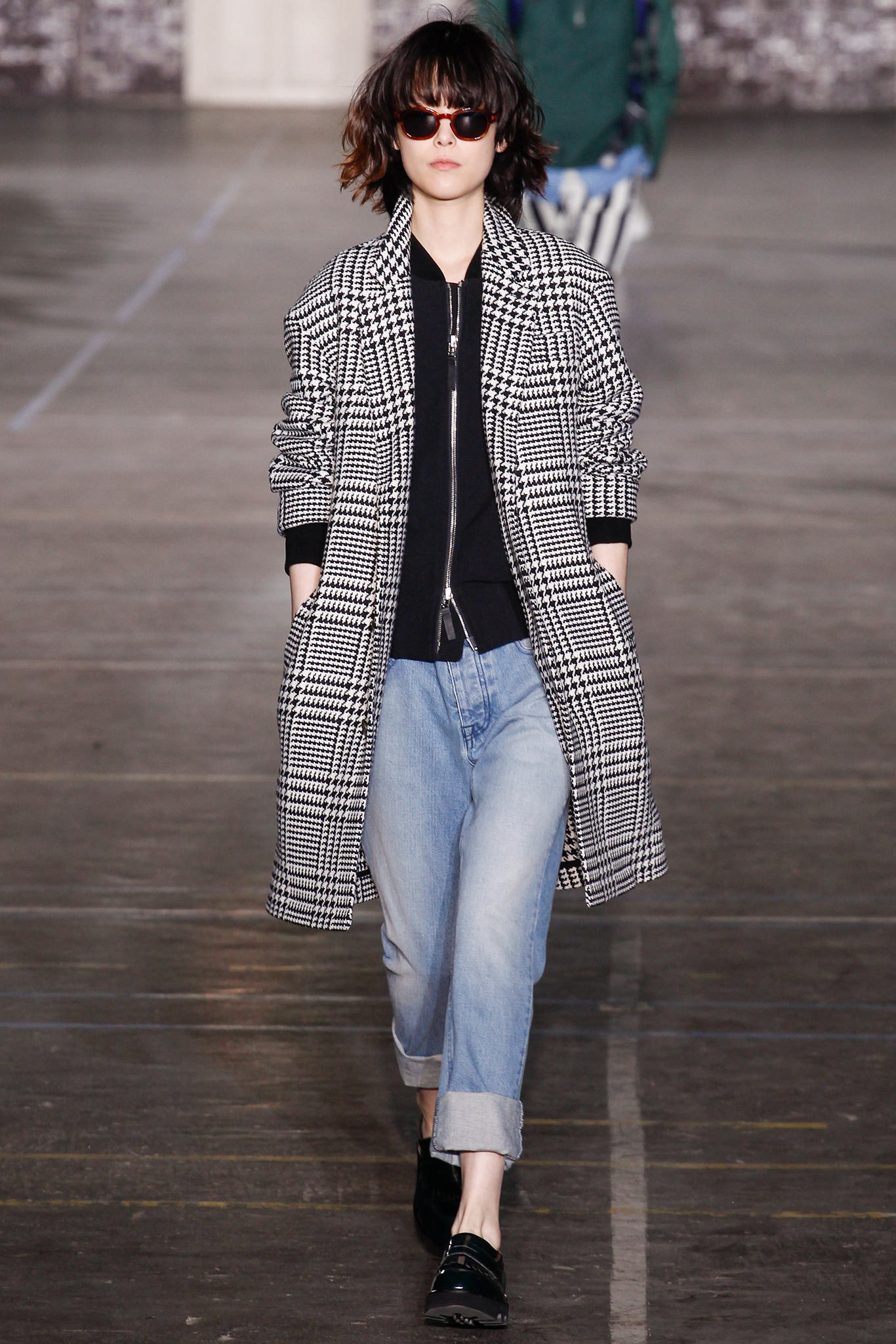 checked coat with black top