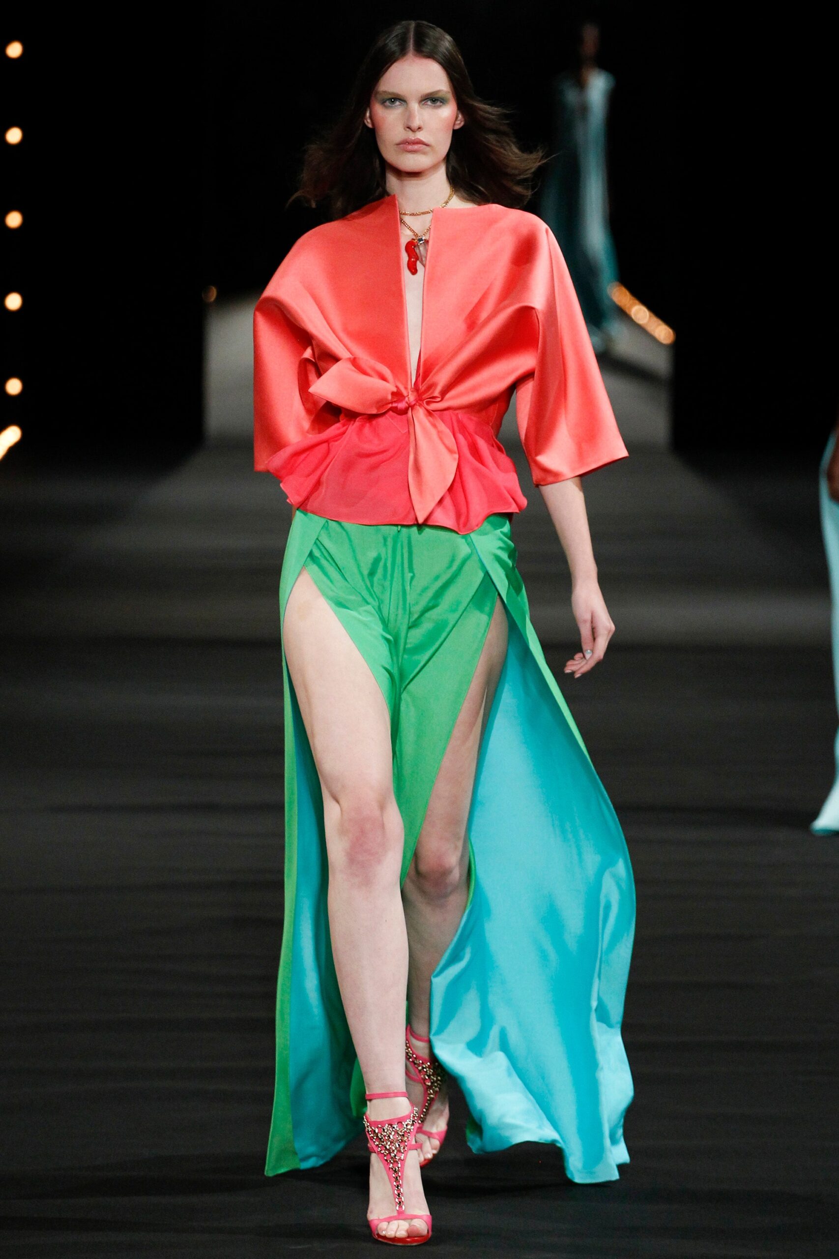 coral silk top with green blue skirt