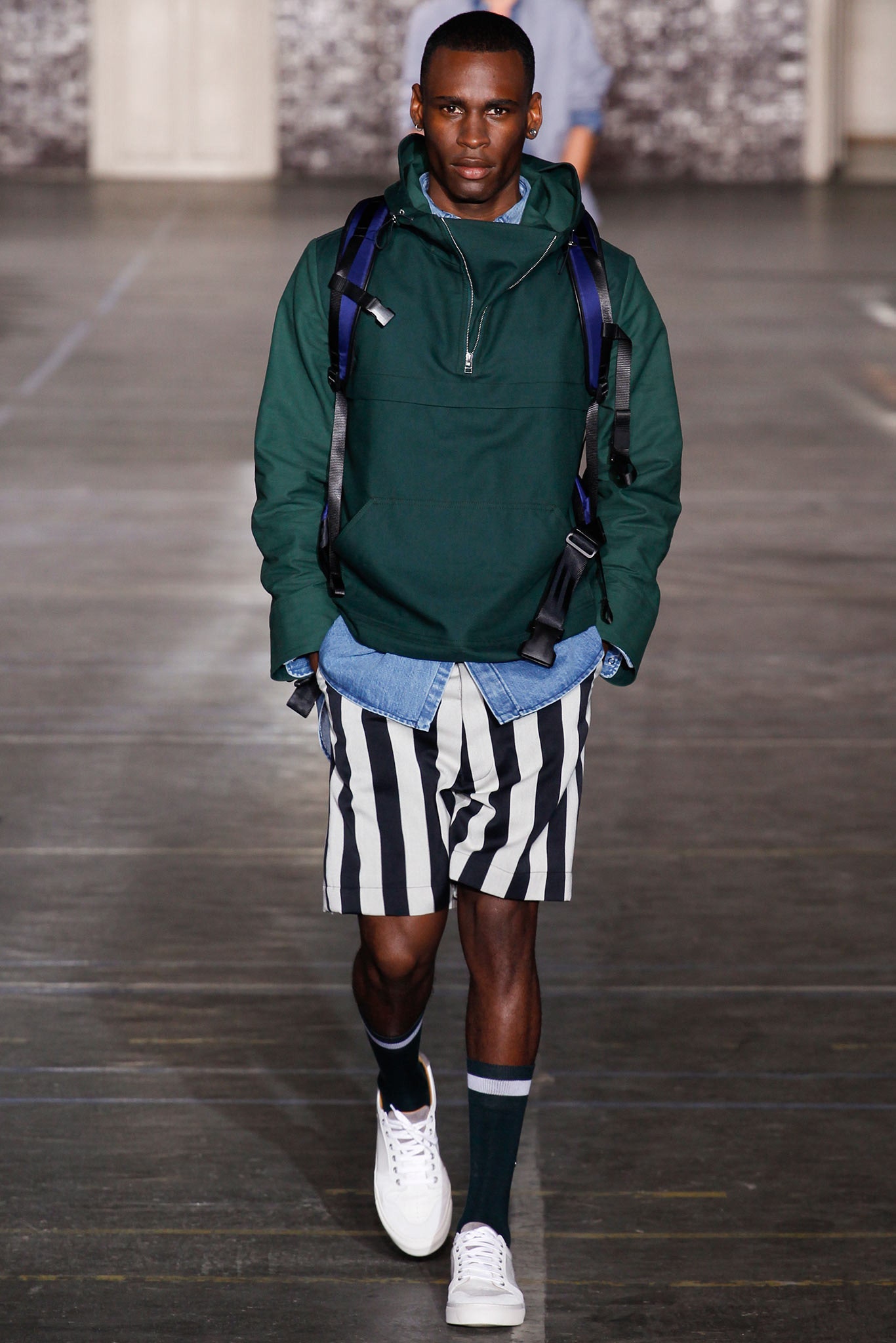green hoodie with striped shorts