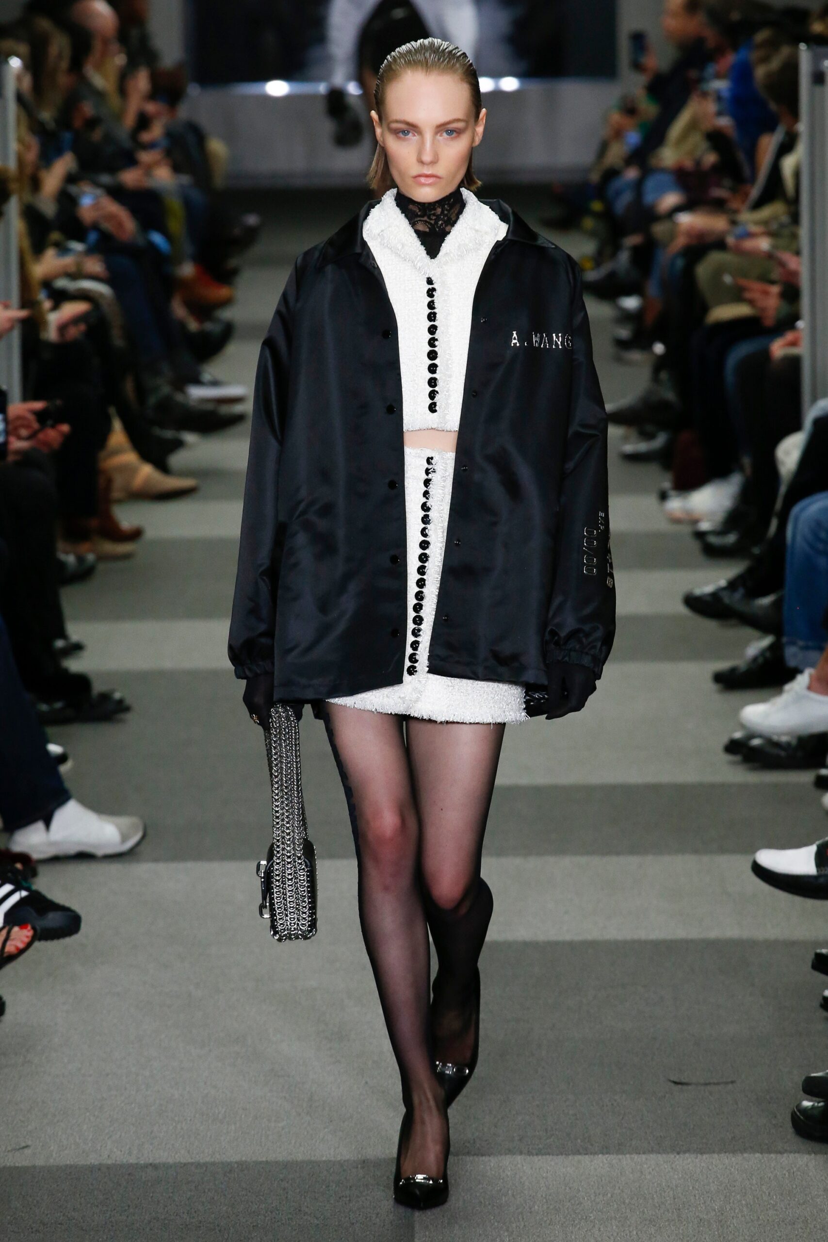 black oversized jacket white mini dress