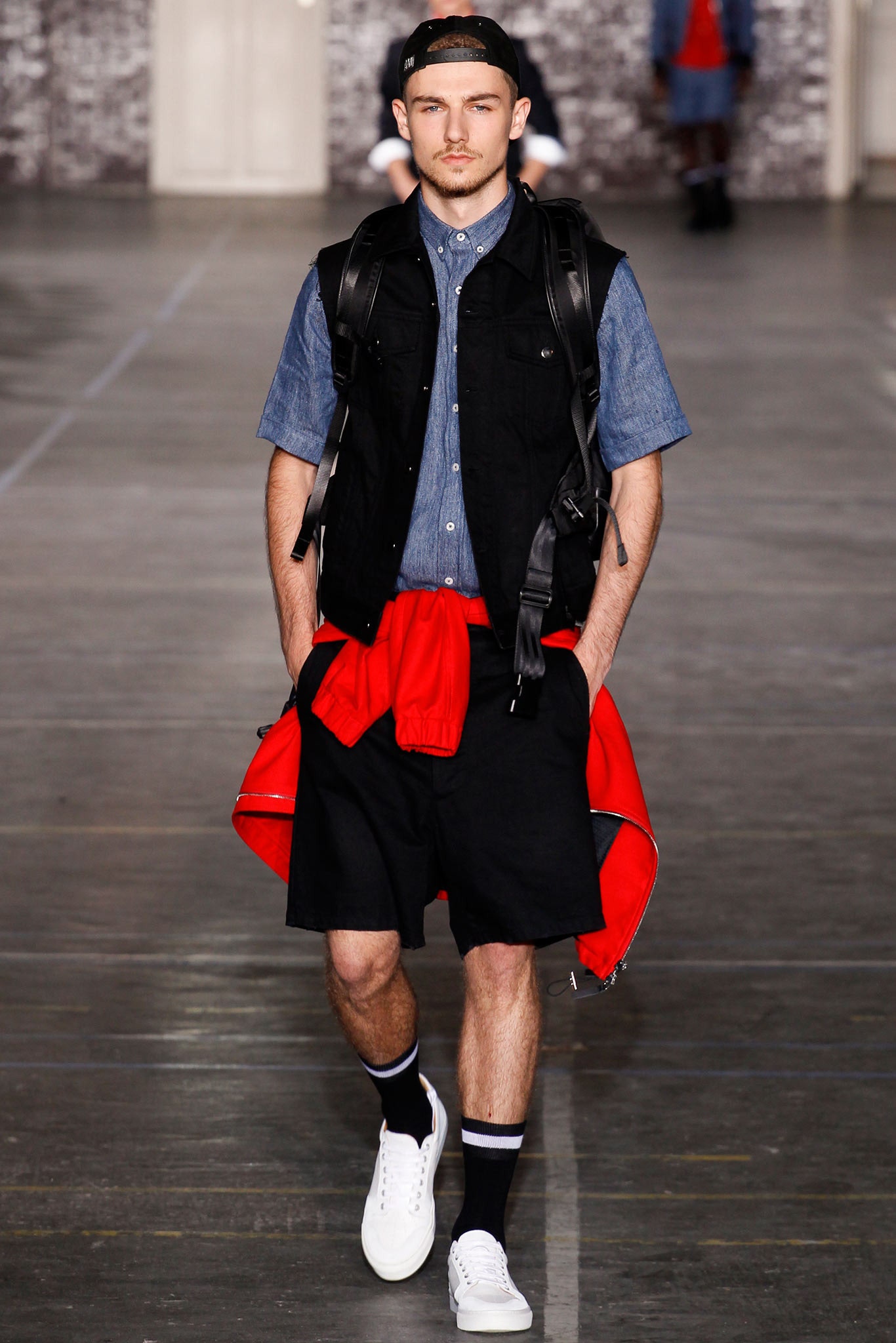 black denim vest with blue shirt