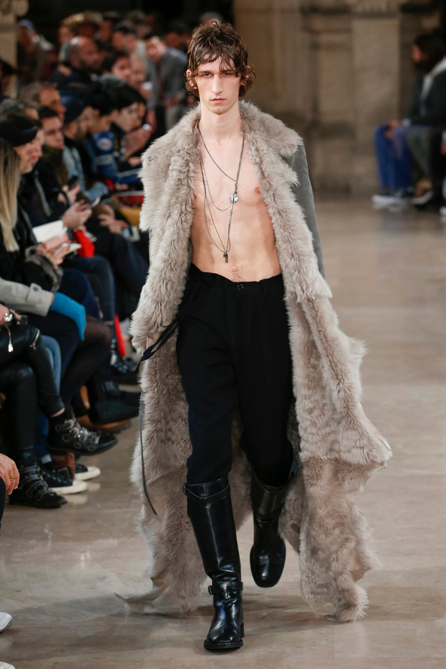 gray faux-fur coat with black pants