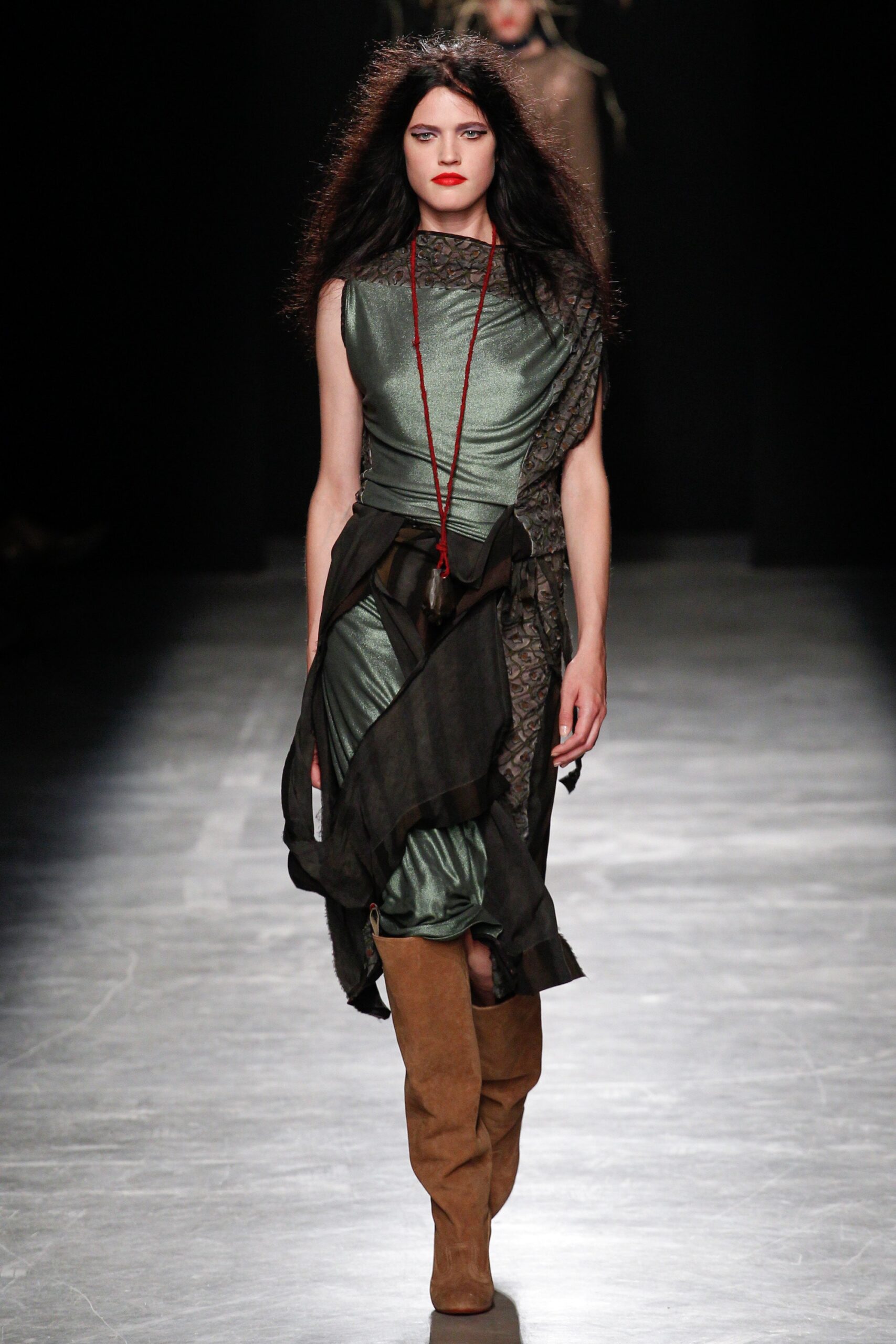 fitted green silk midi dress with brown boots