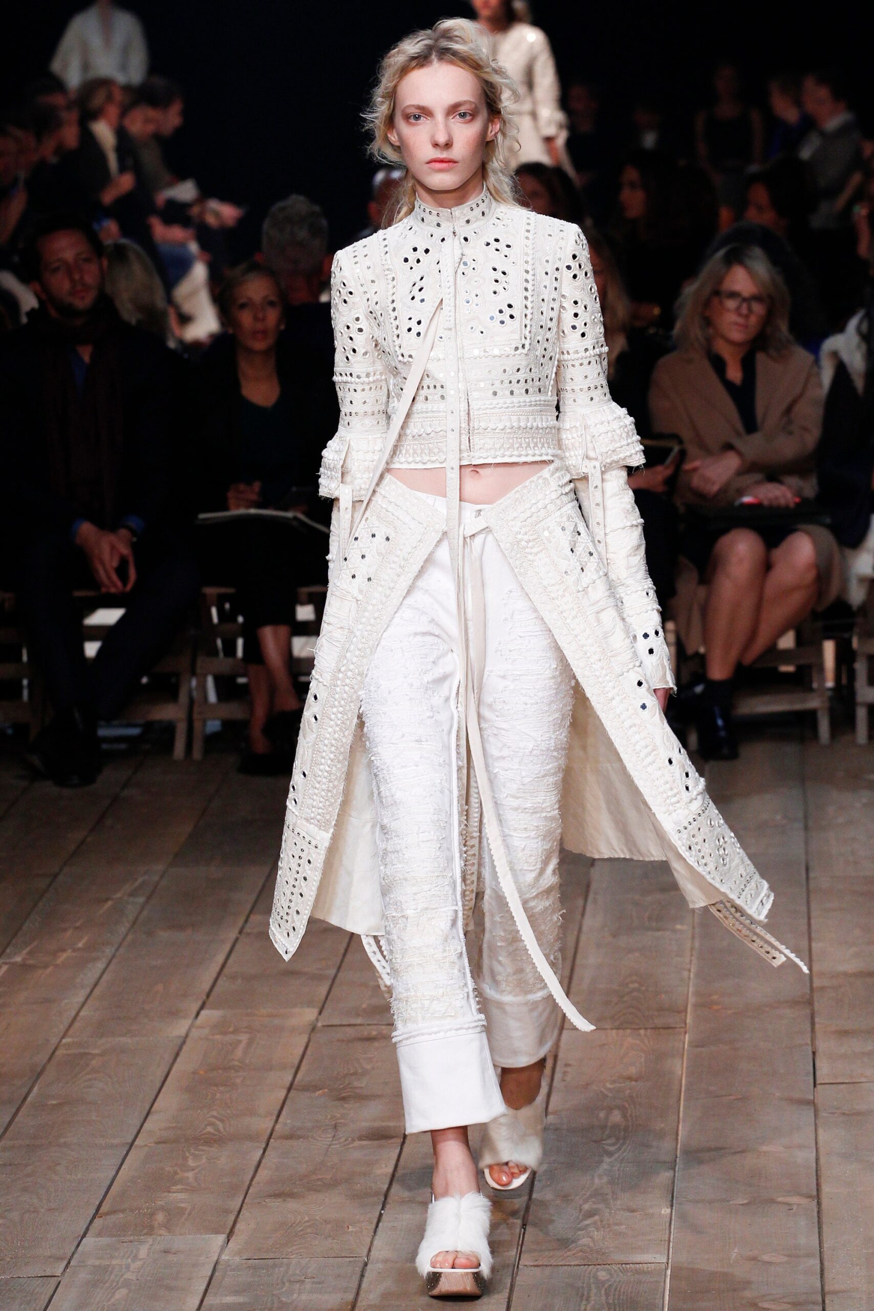 white embroidered fitted jacket and pants