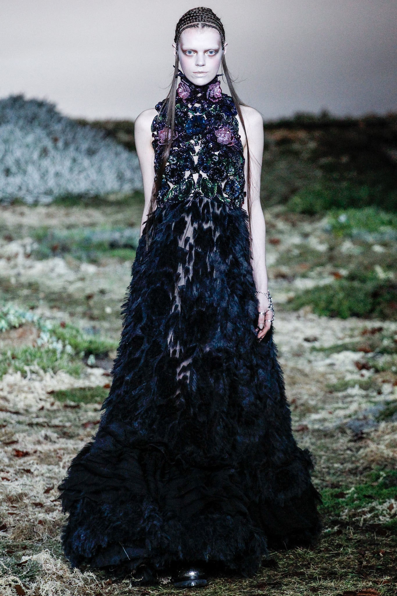 black feathered sleeveless gown