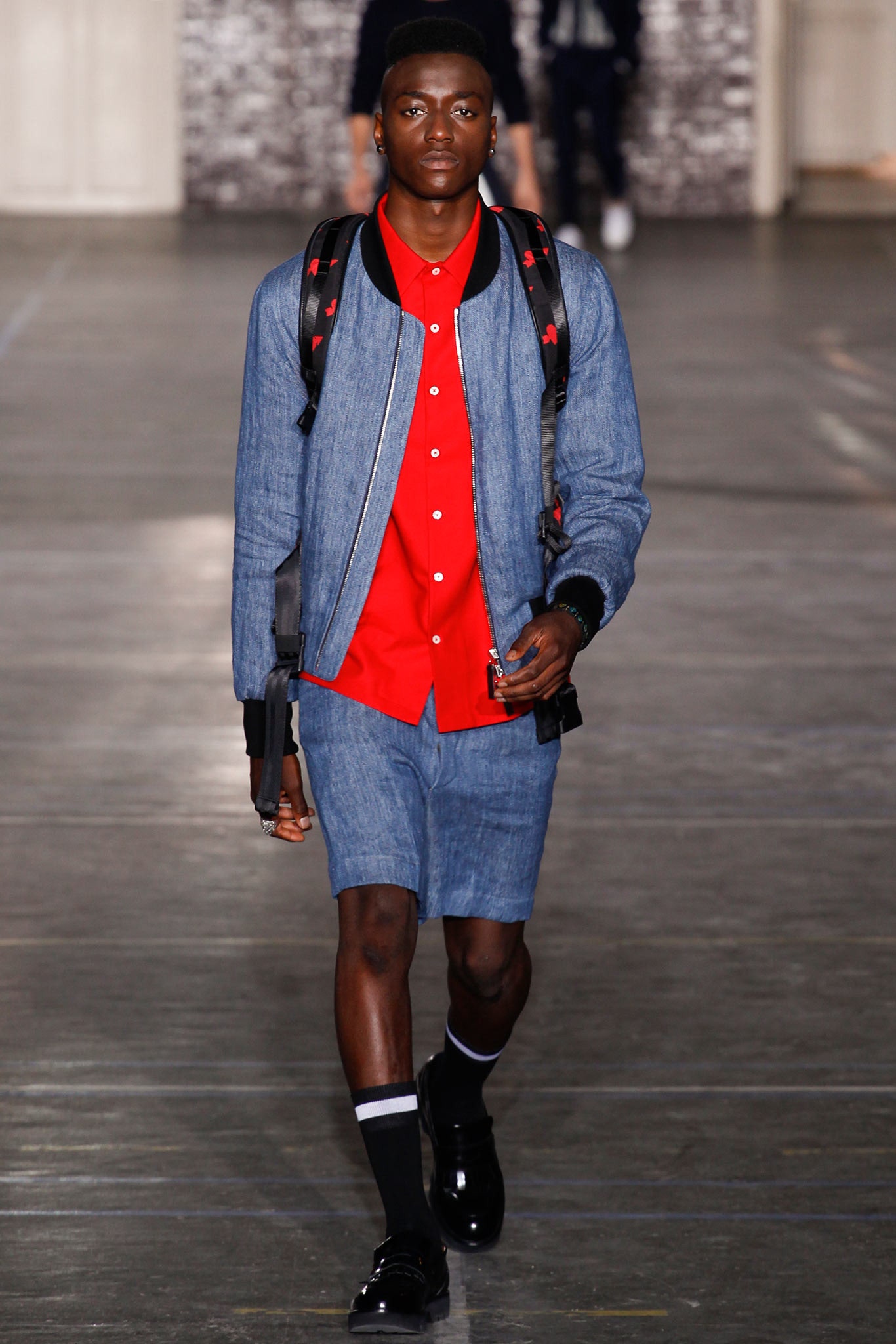 blue denim jacket and red shirt