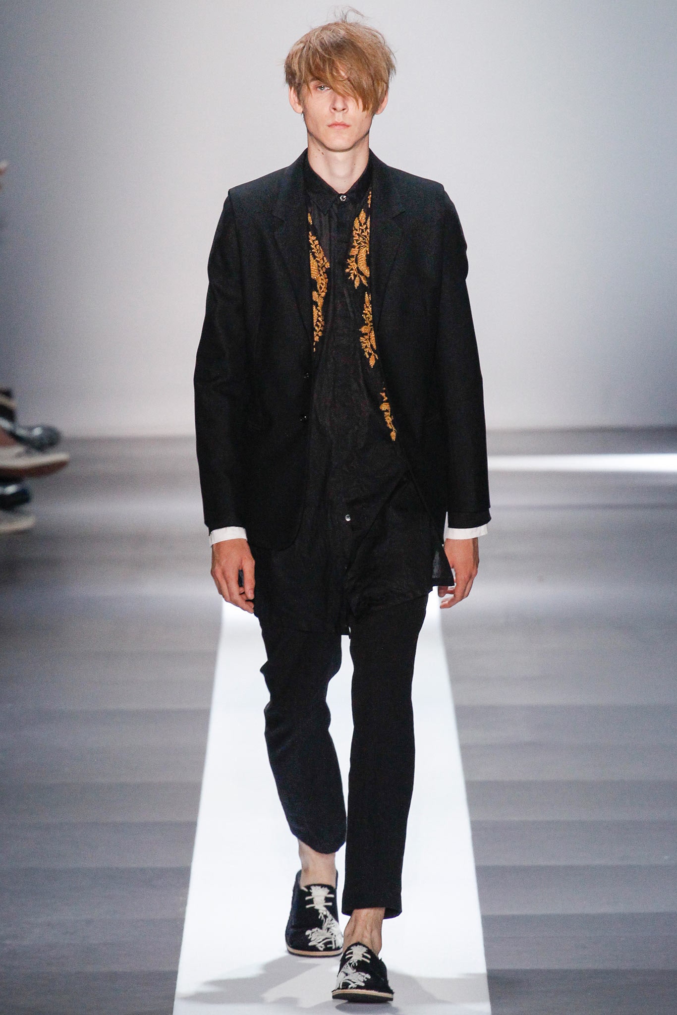 black tailored suit with shoes