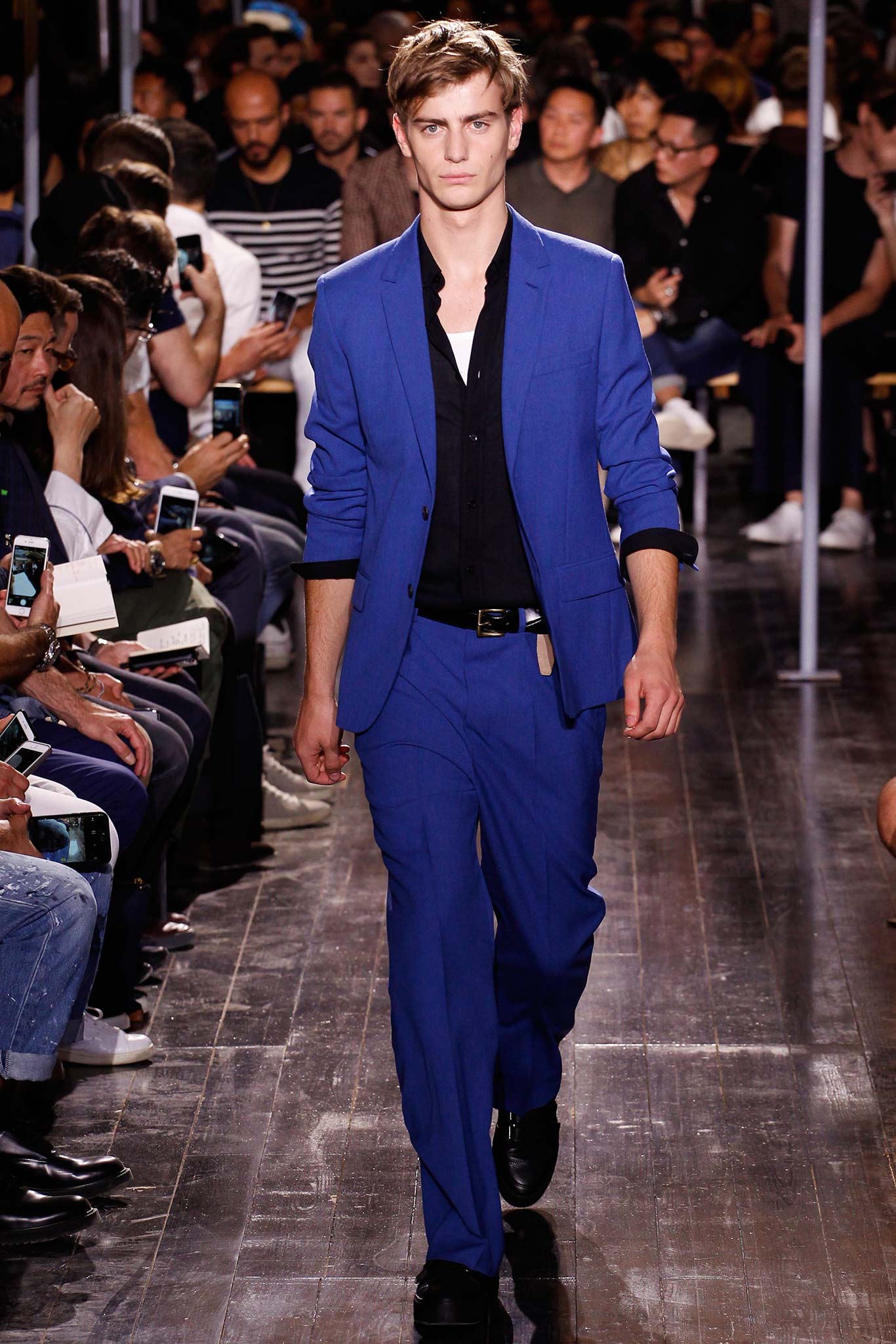blue tailored suit with black shirt