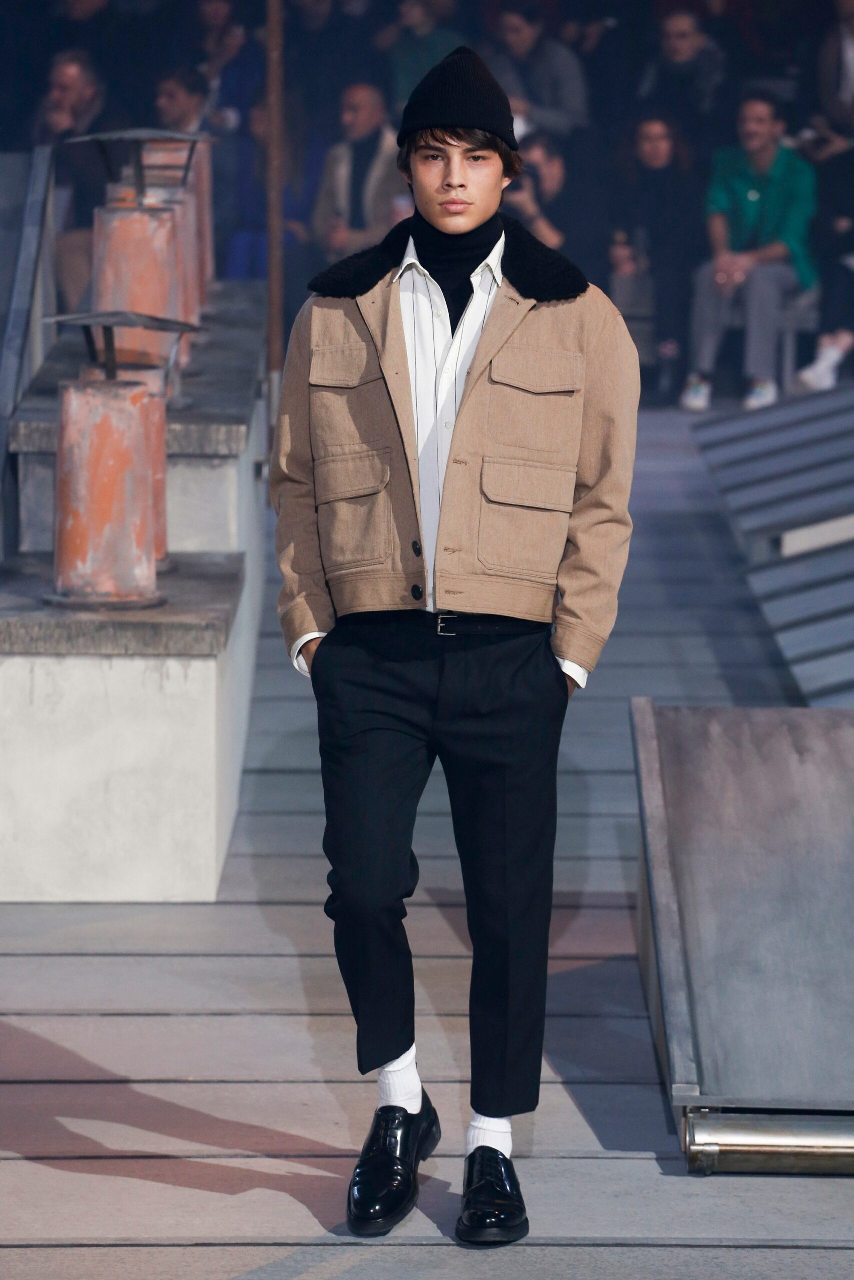 beige jacket white shirt black pants