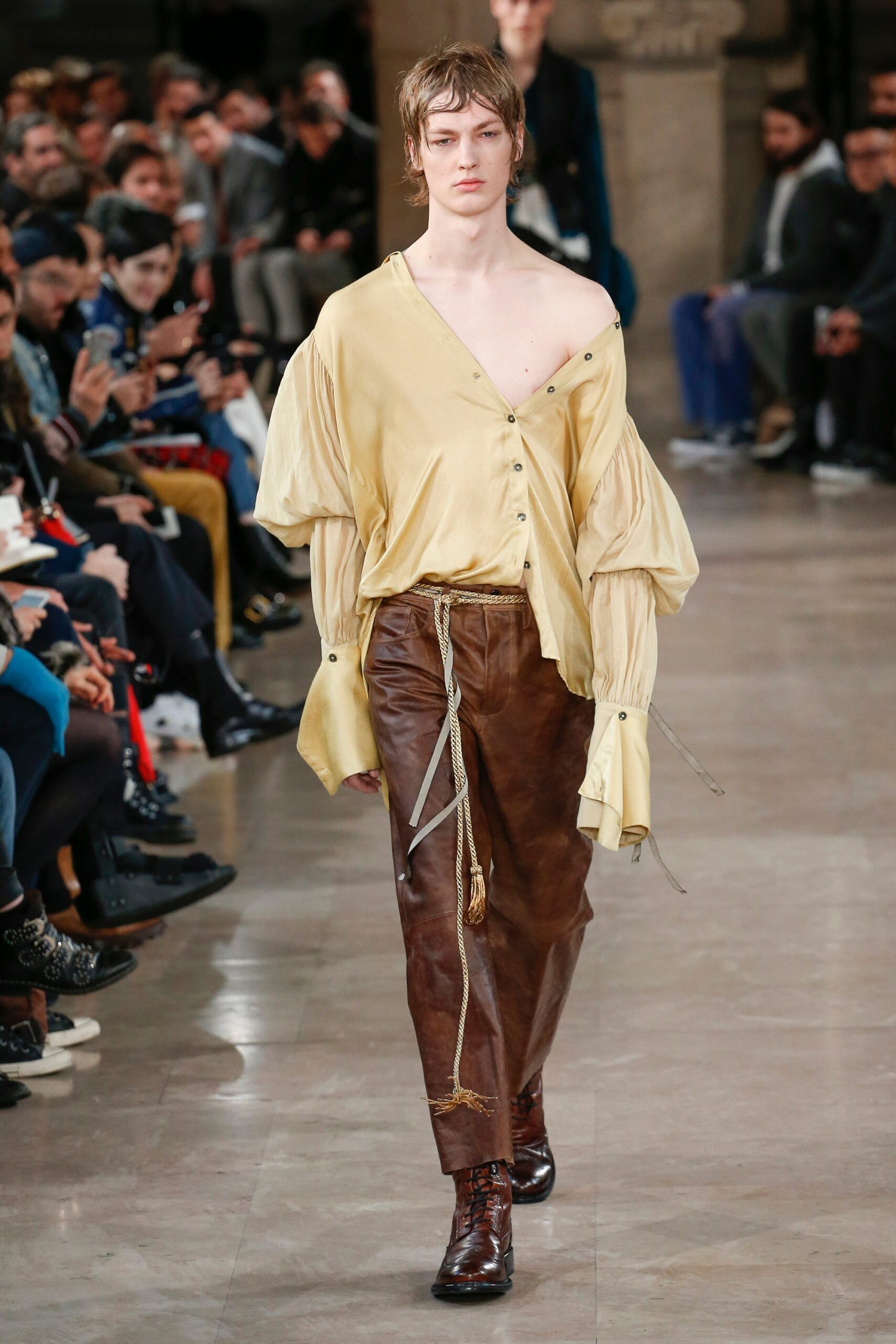 yellow silk shirt and brown leather pants