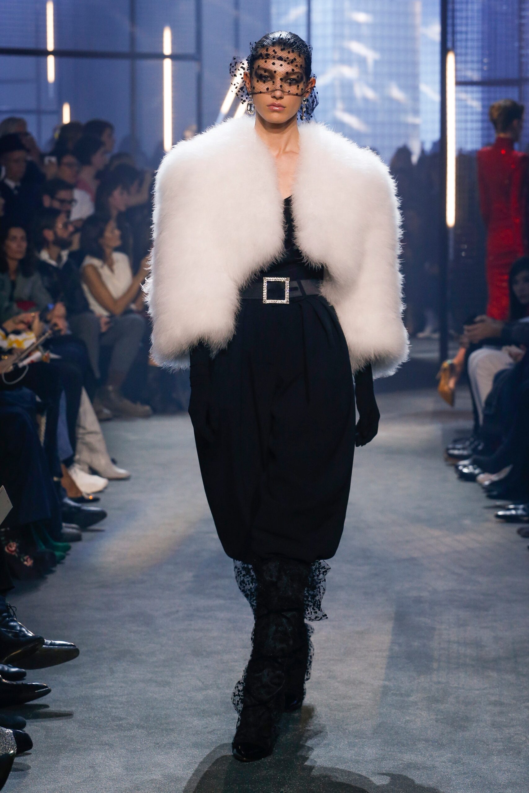 black fitted dress with white cape