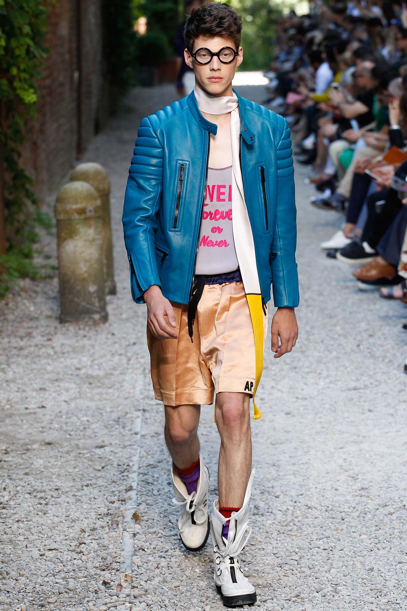 blue leather jacket with orange shorts