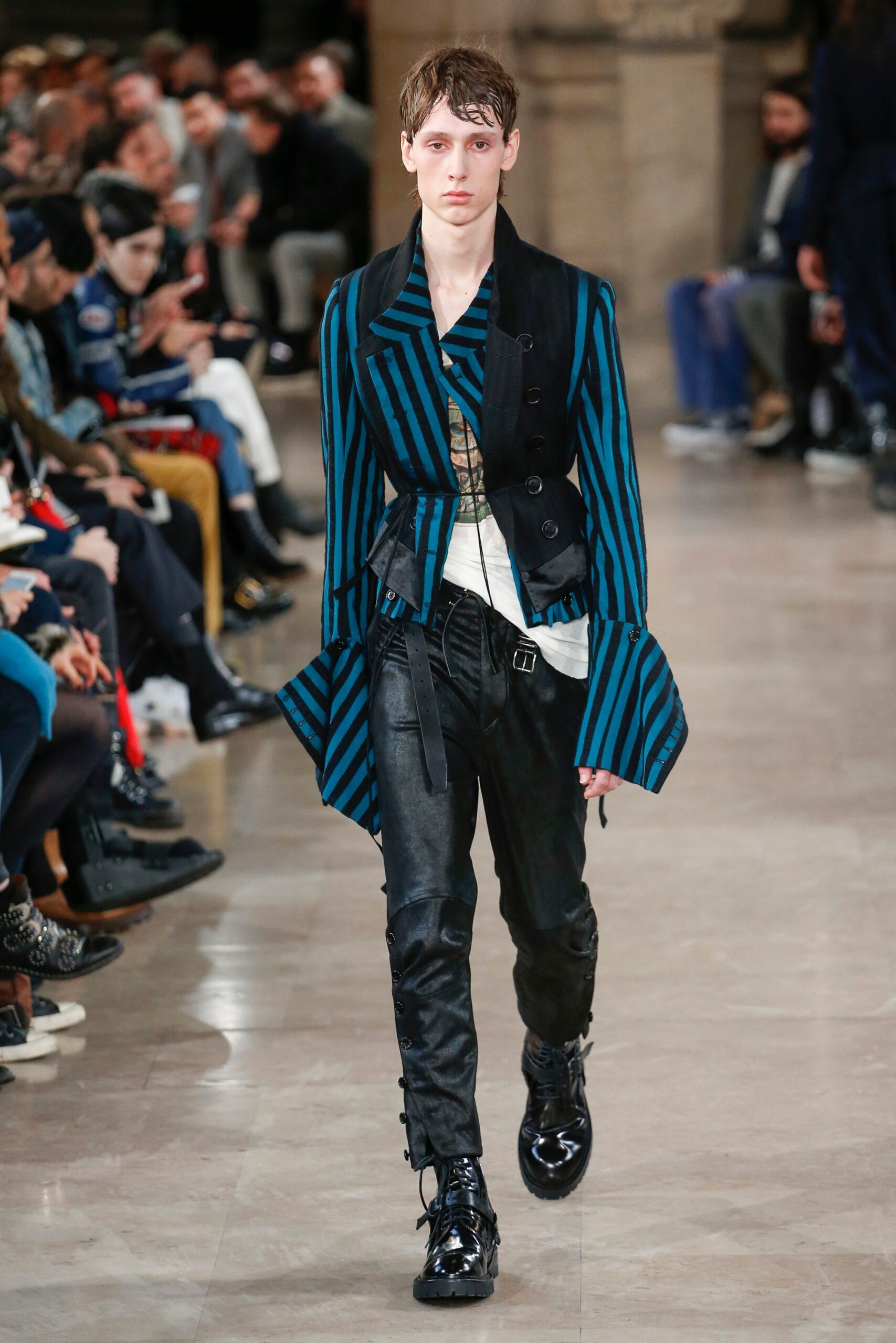 fitted black and blue jacket with leather pants
