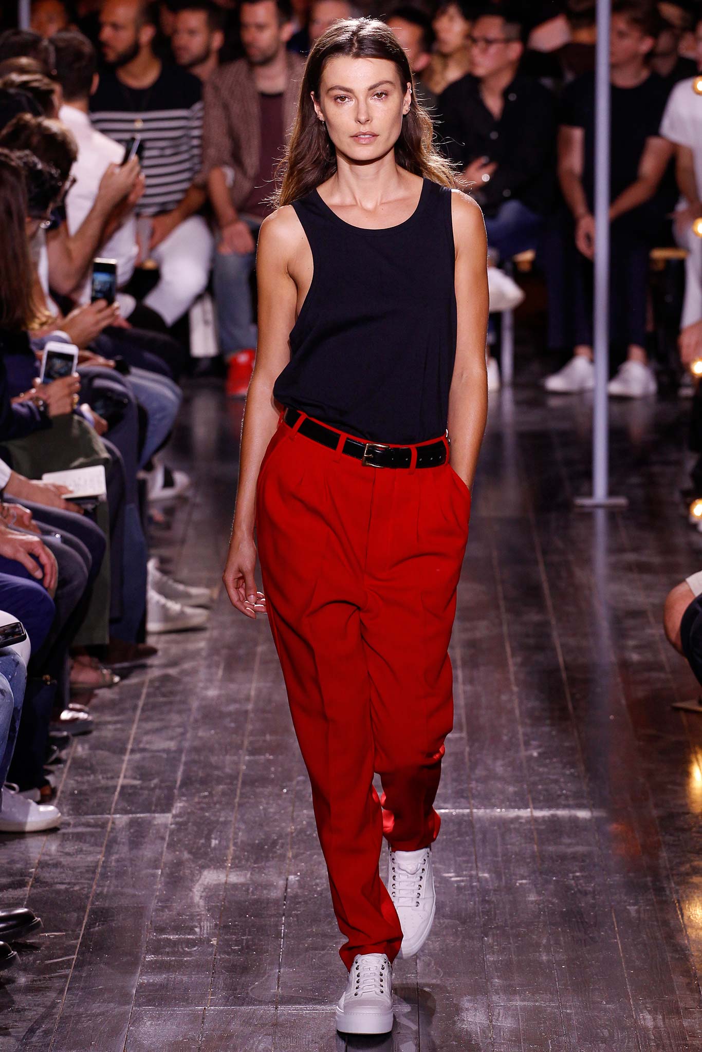 black sleeveless top red pants
