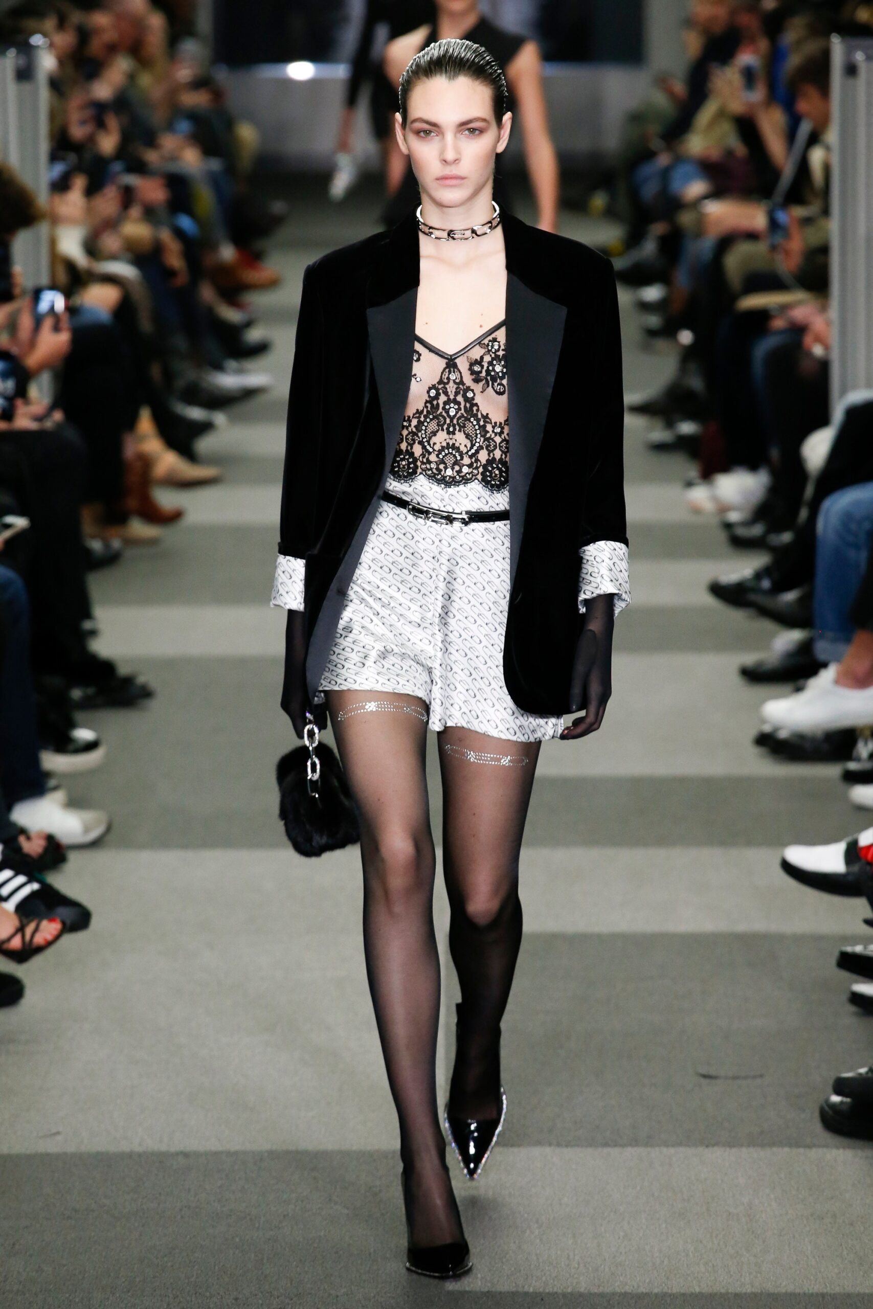 black blazer with lace top and white shorts