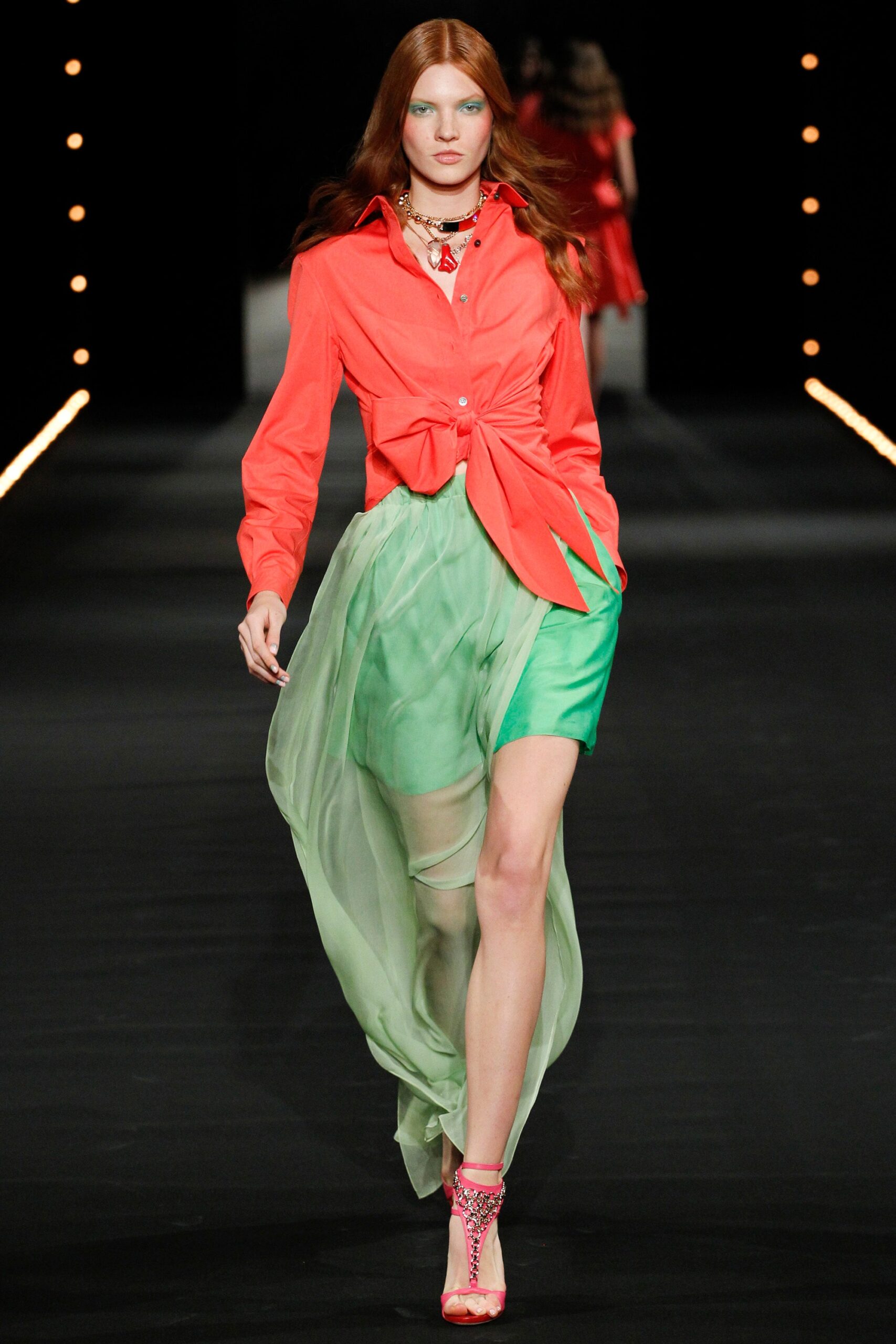 red fitted shirt with green skirt