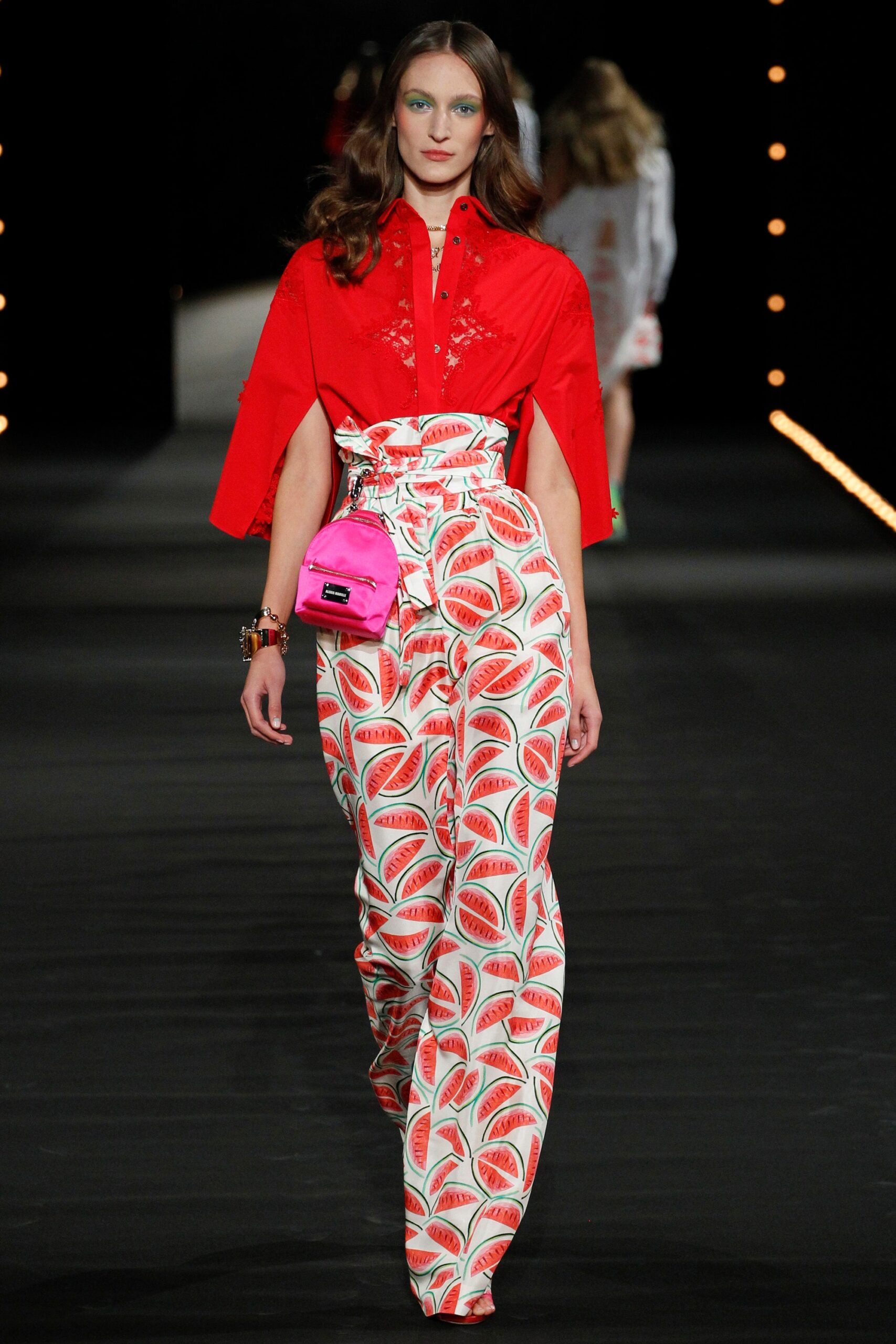 red embroidered top with printed pants