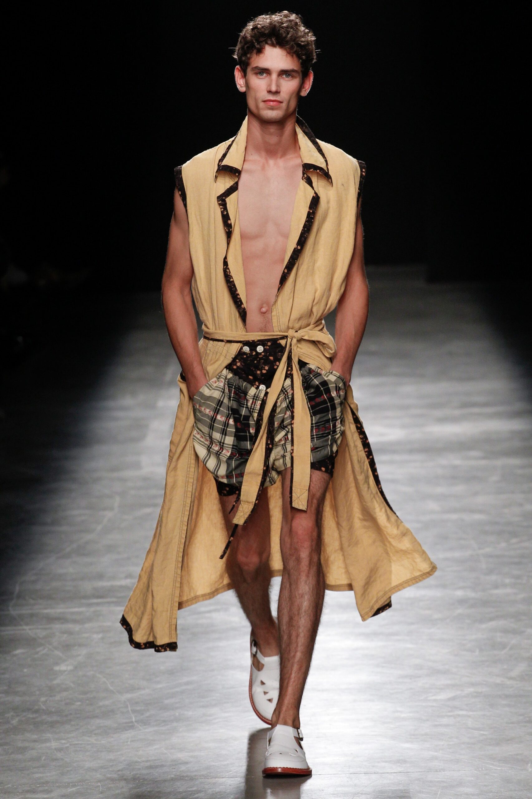 beige relaxed belted dress with plaid shorts