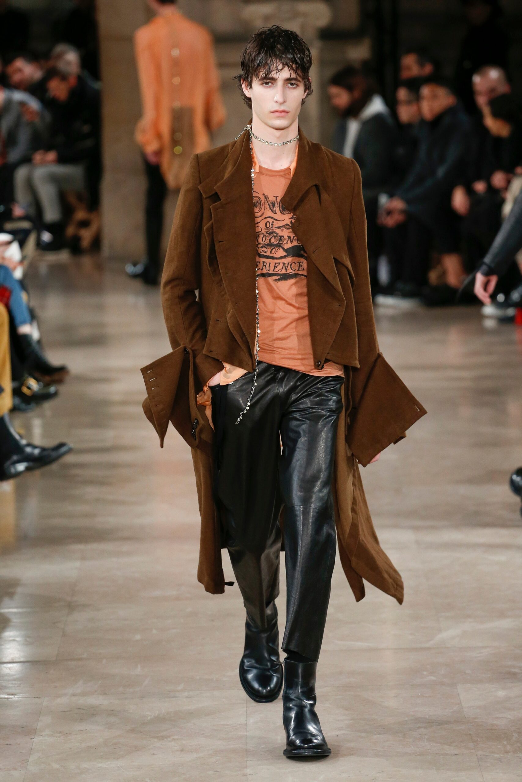 brown suede coat with orange t-shirt
