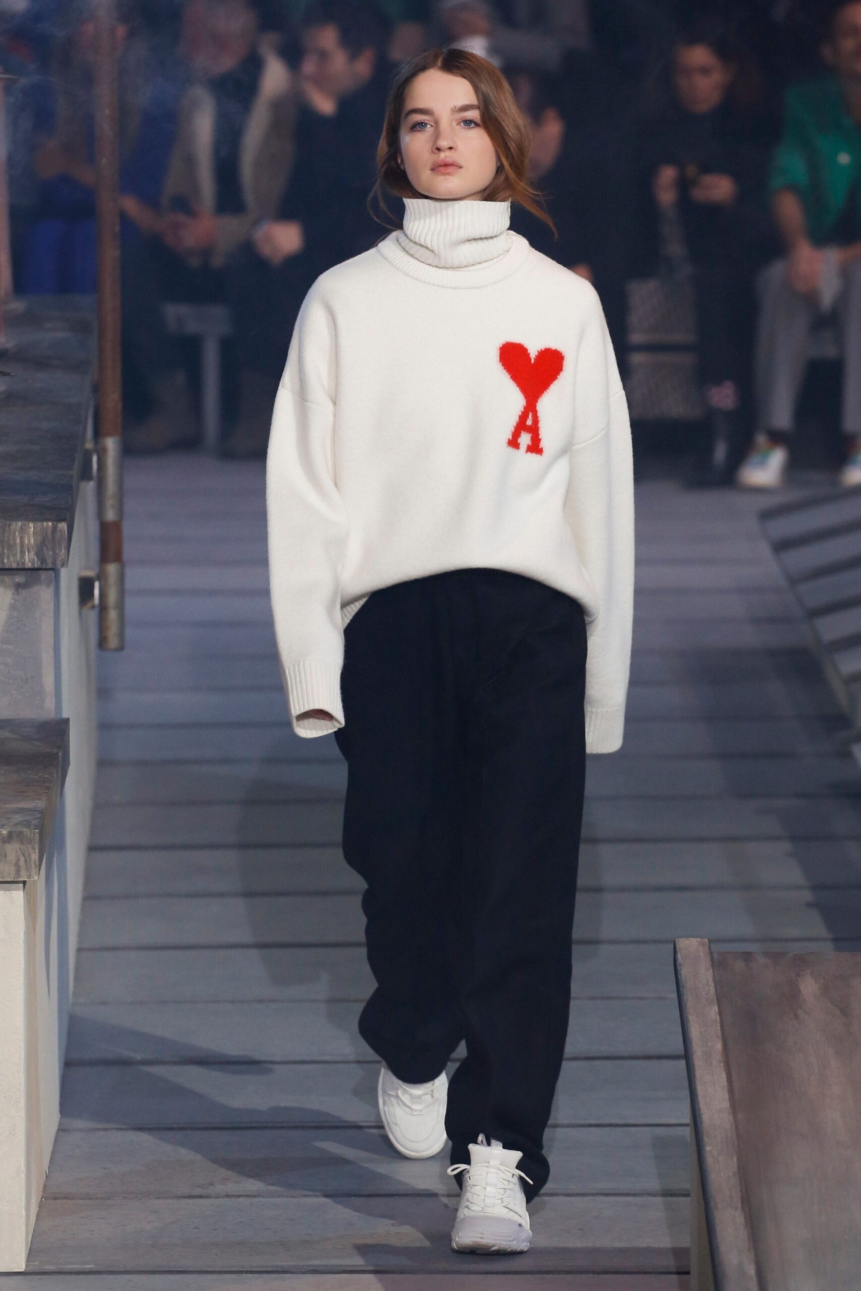 white wool relaxed sweater with black pants