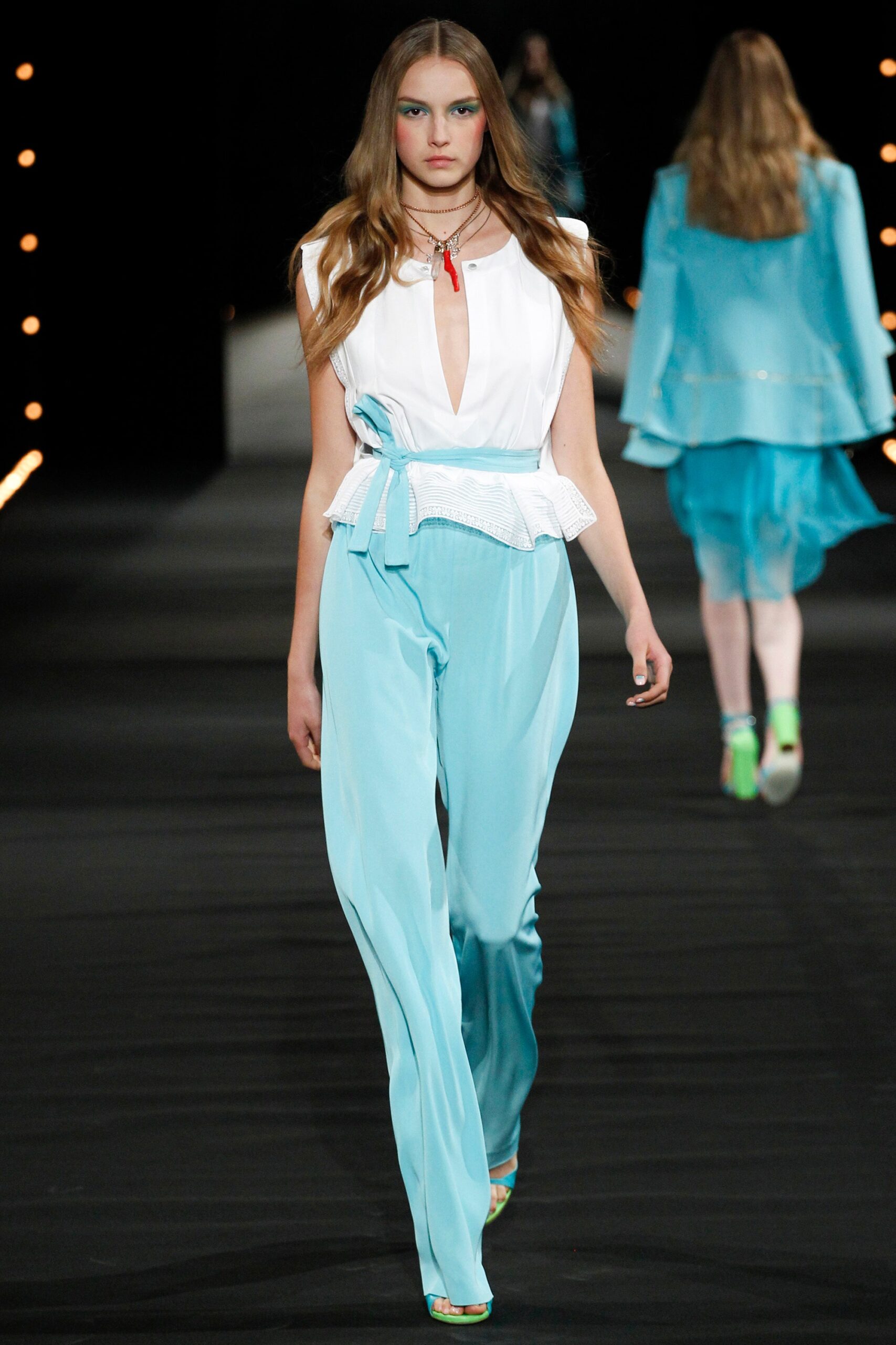 blue and white fitted top with pants
