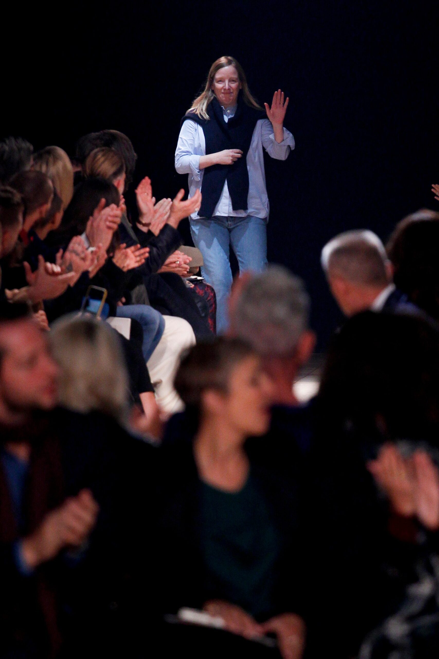 blue shirt black vest slim jeans
