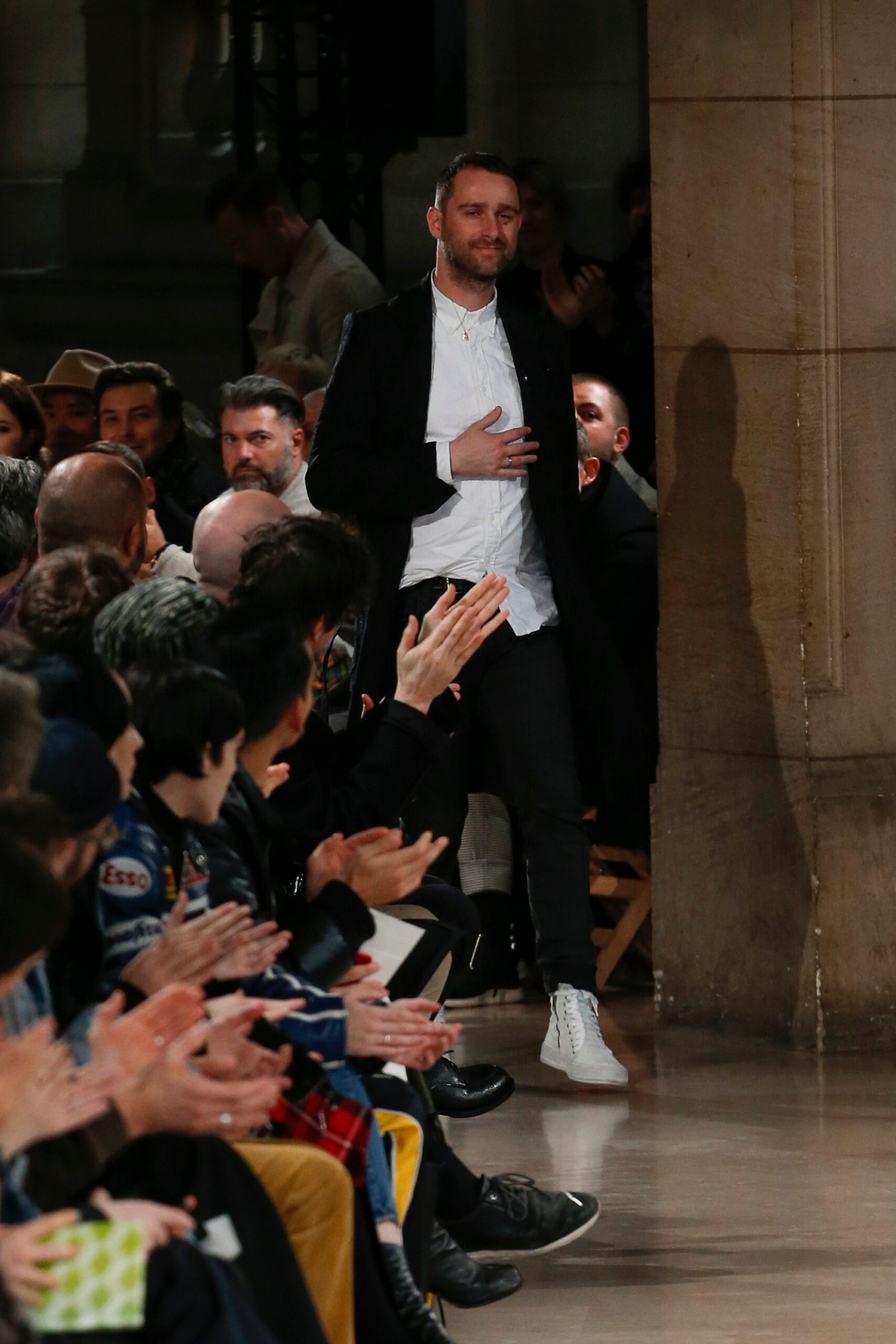 black coat white shirt black pants