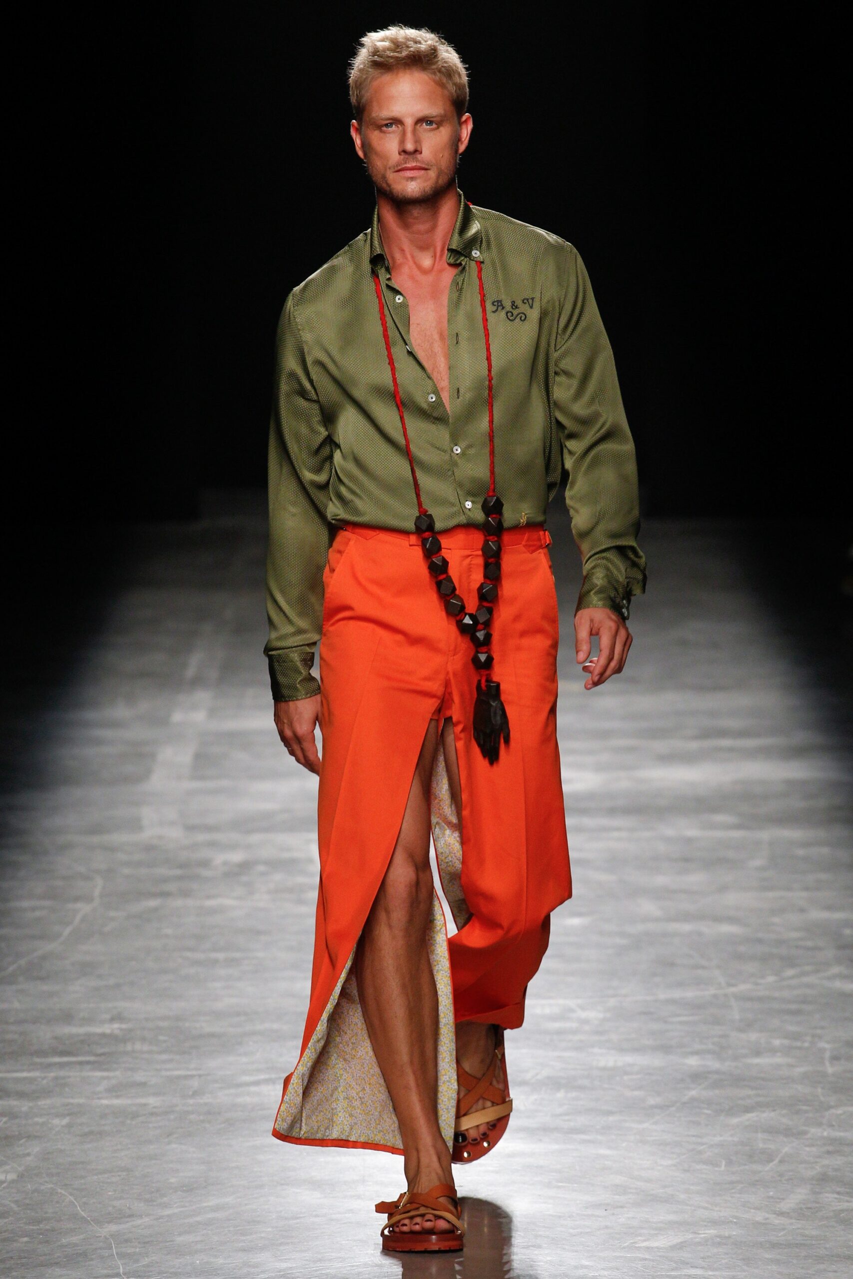 green shirt and orange pants