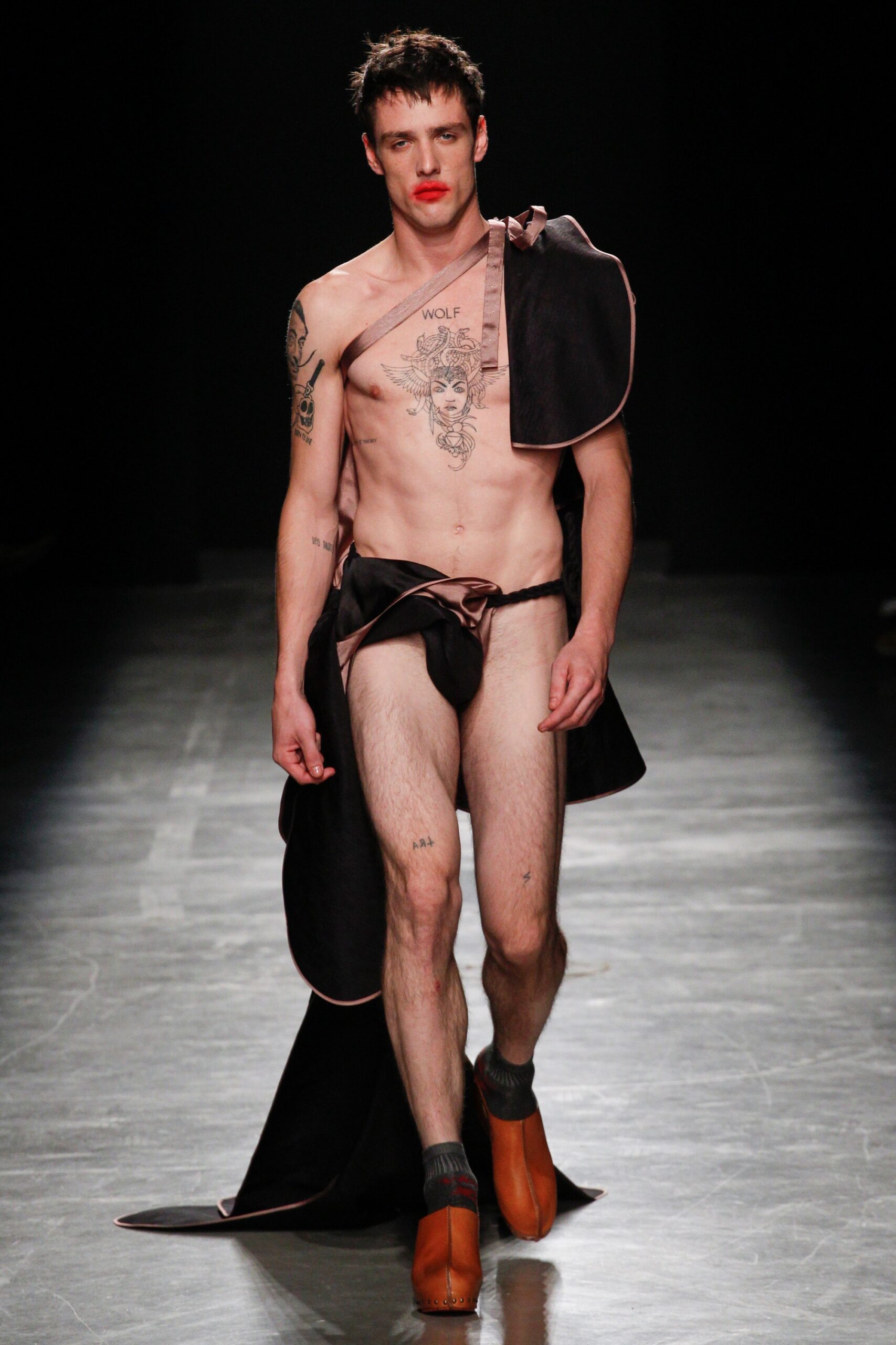 black silk asymmetric cape and shorts