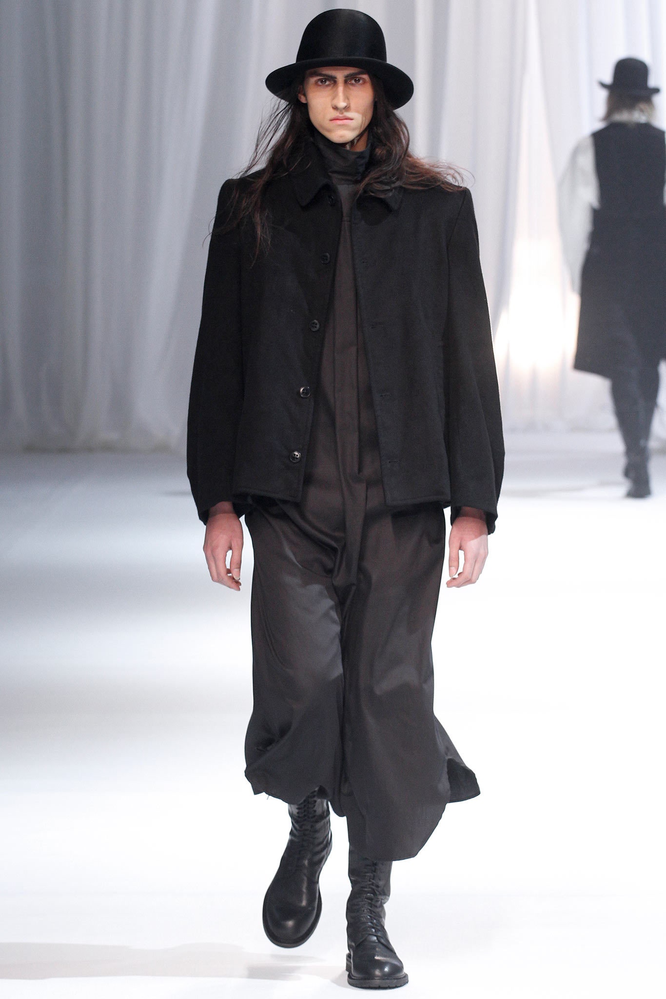 black wool coat and jumpsuit