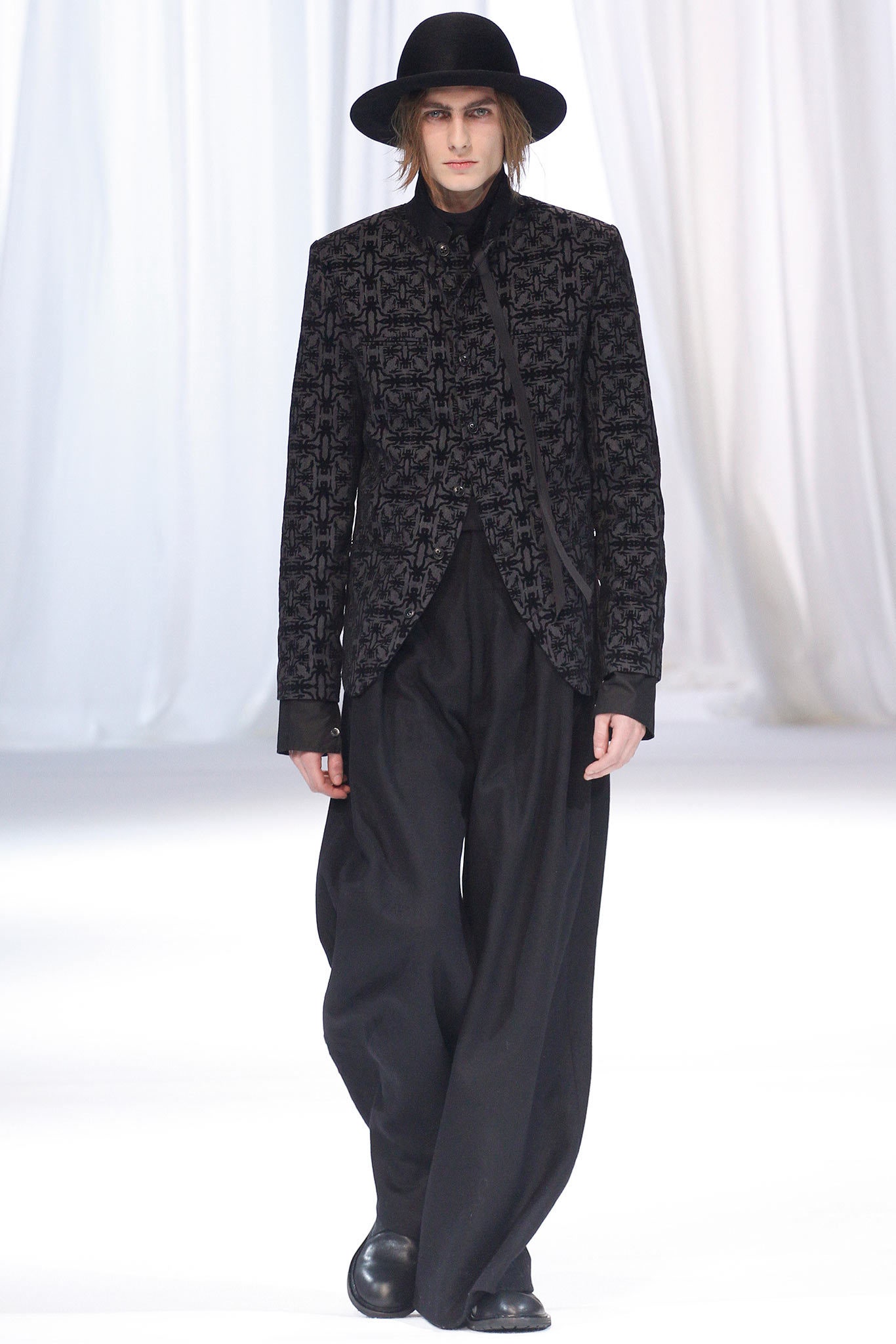 black embroidered blazer with relaxed pants