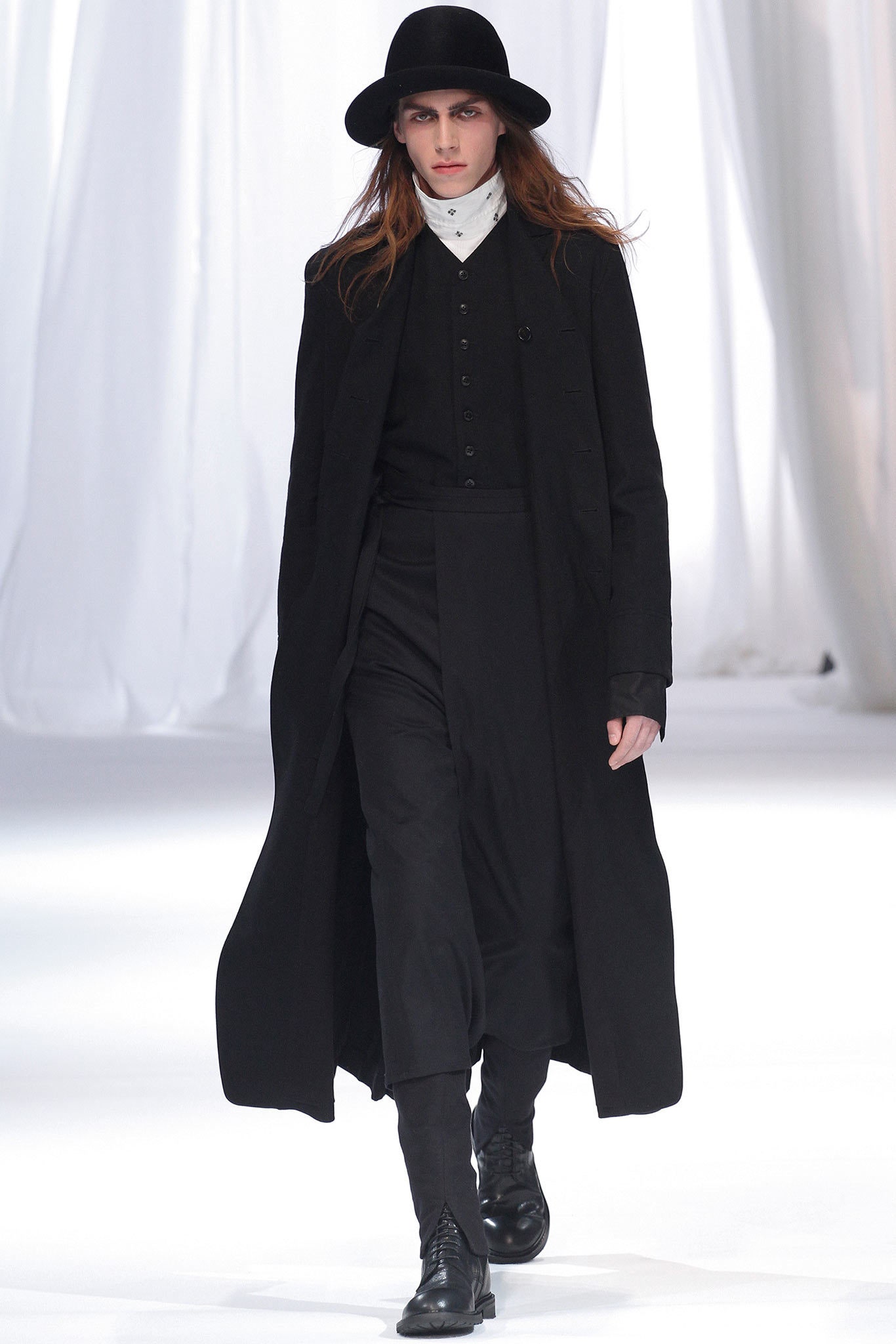 black wool coat with tailored pants
