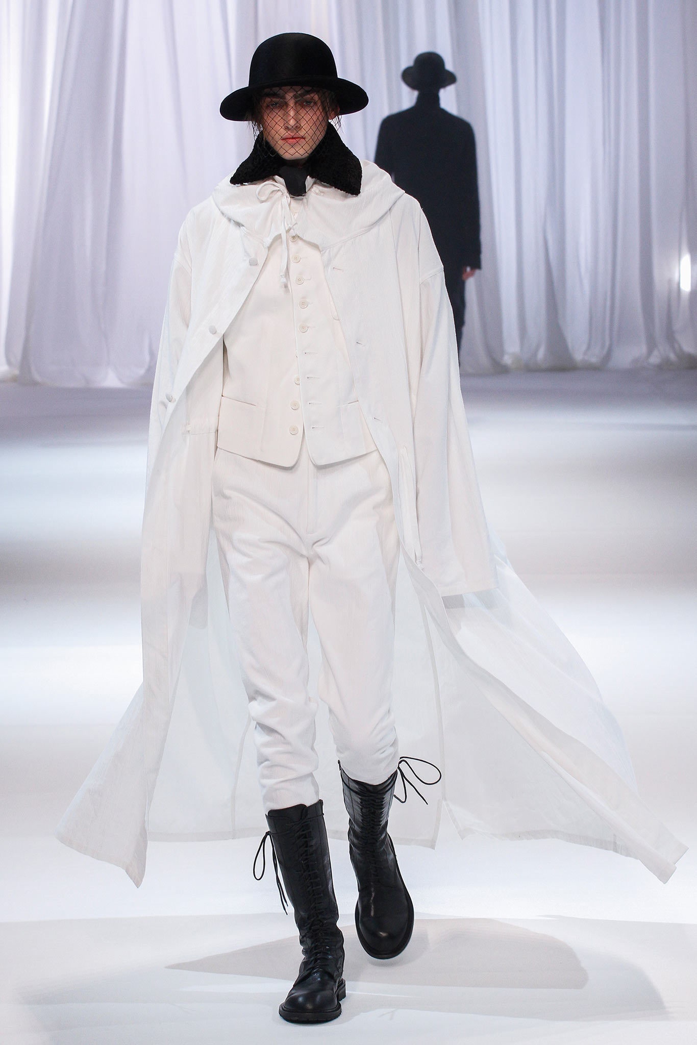 white coat with black accessories