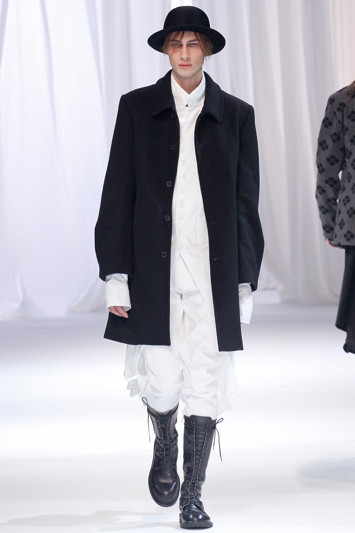 black oversized coat with white pants