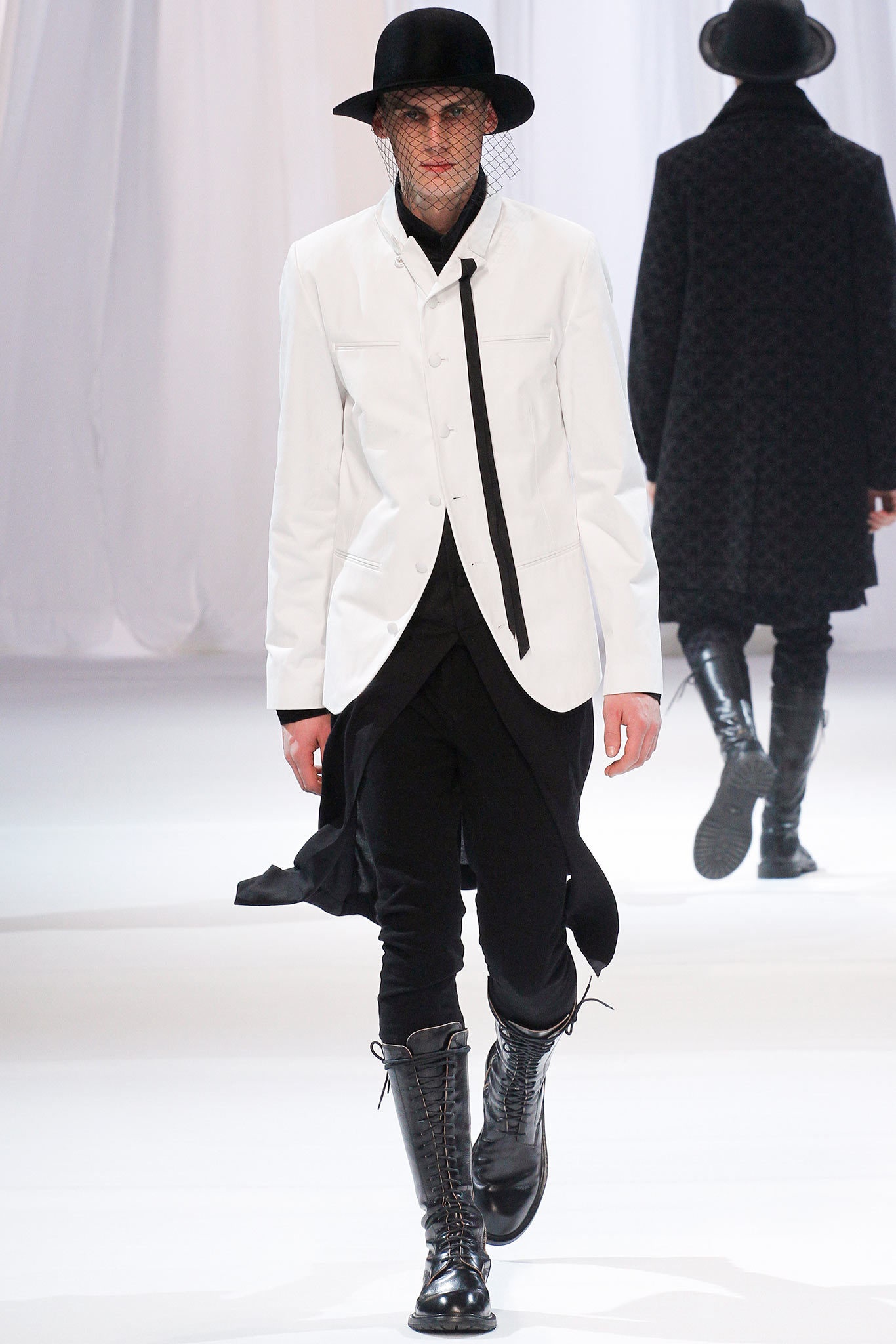 white fitted jacket with black pants