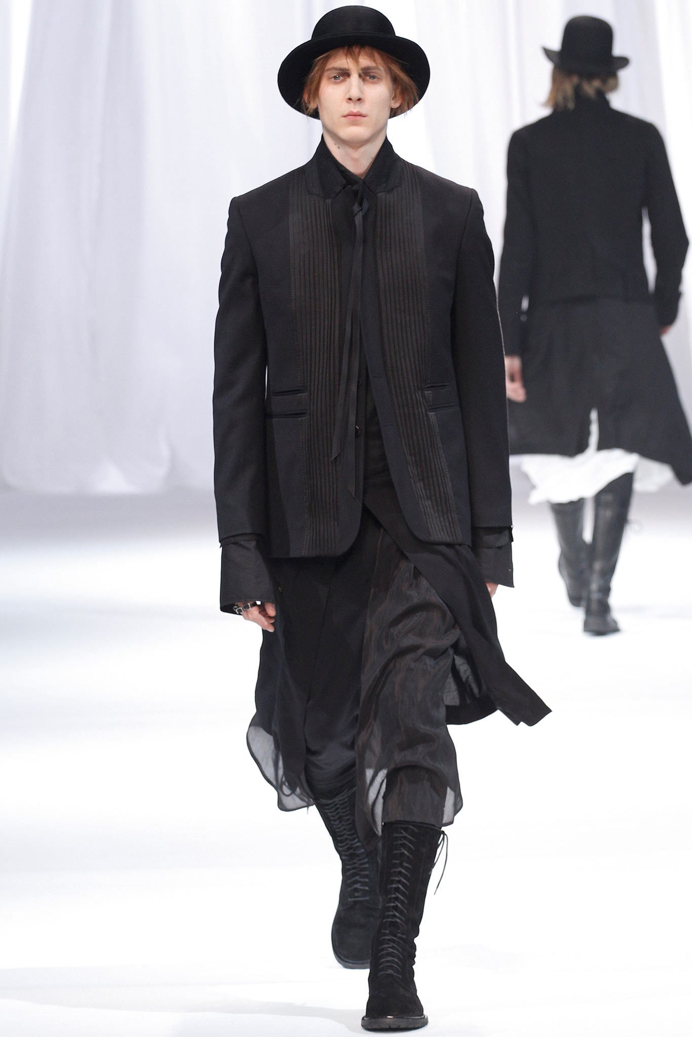 black tailored blazer and relaxed pants