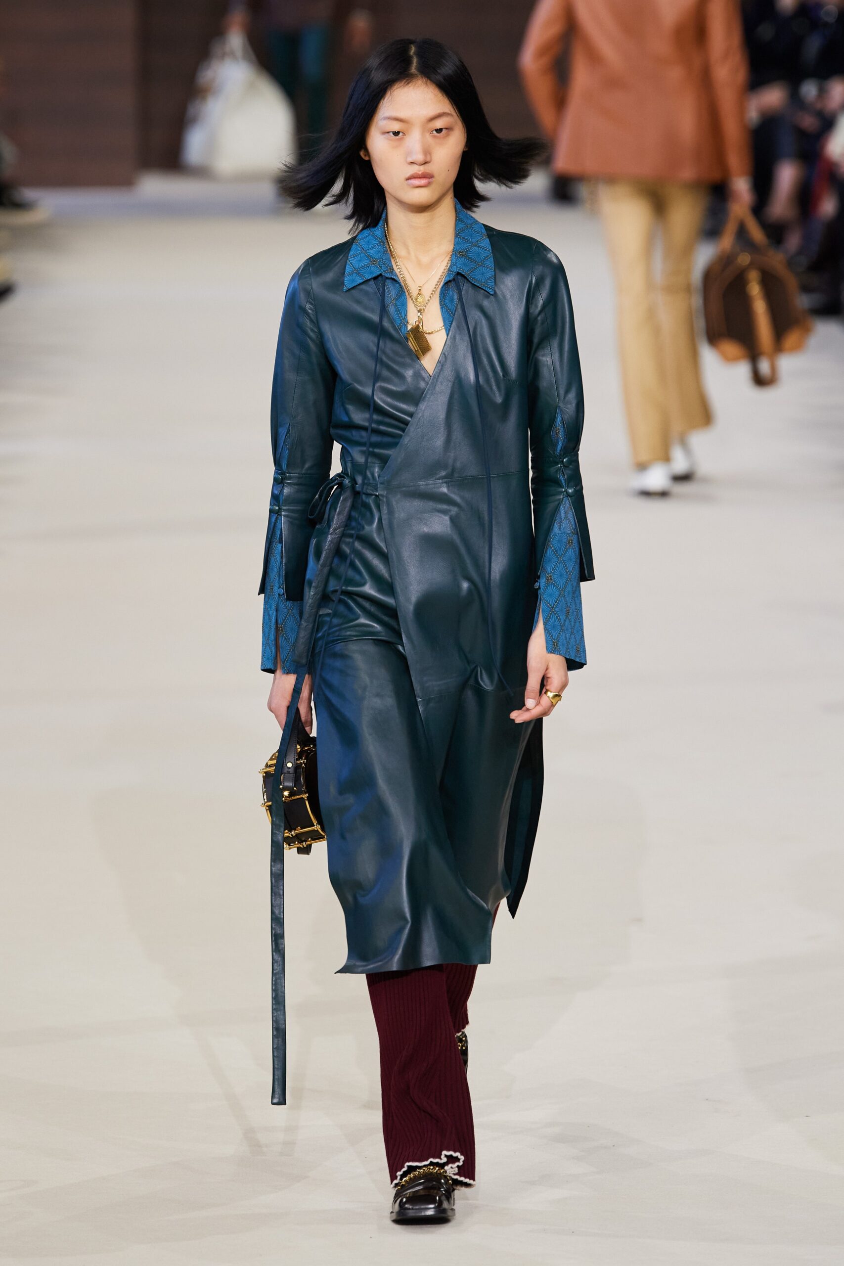 blue leather long-sleeve v-neck fitted midi dress