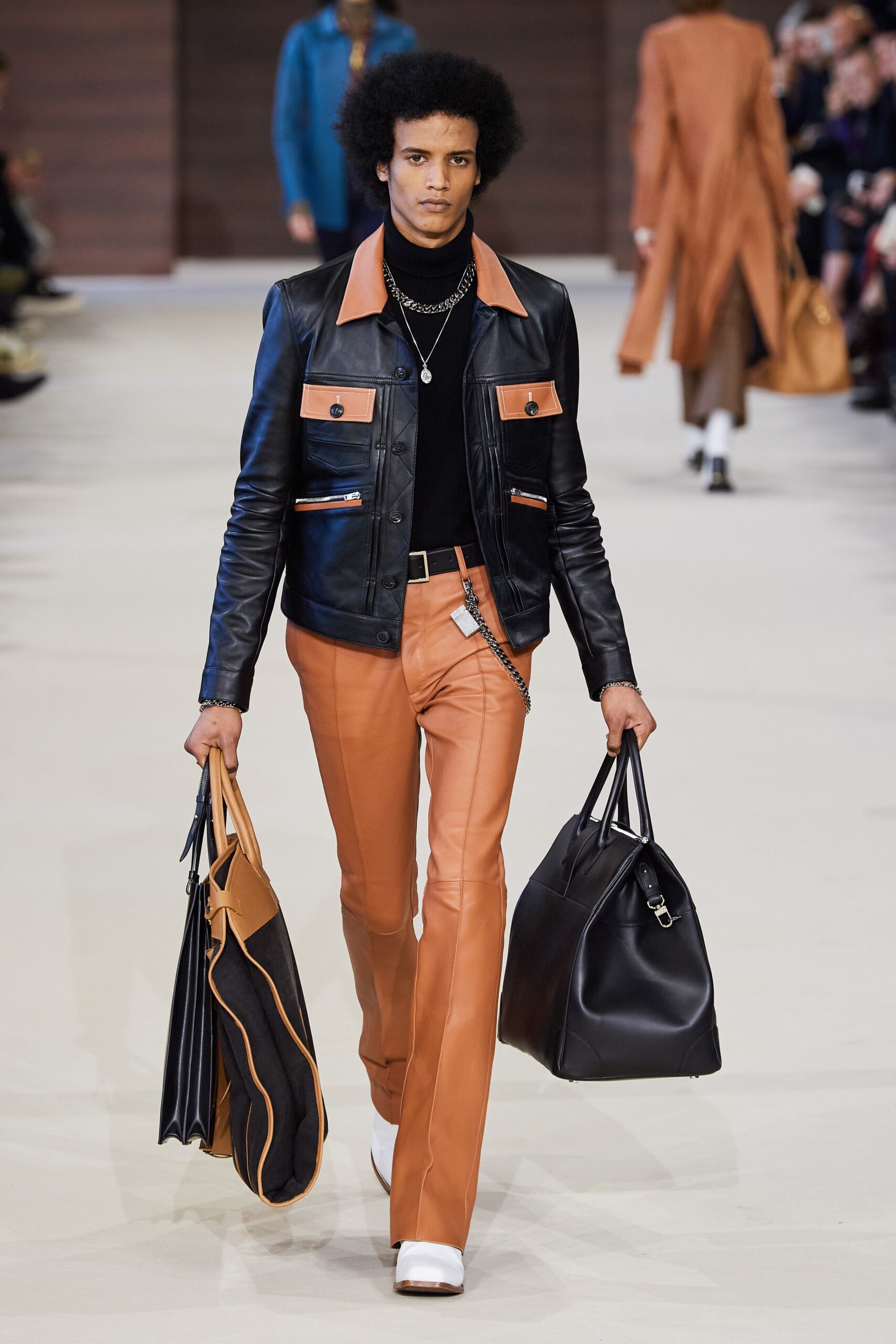 orange leather fitted flared pants