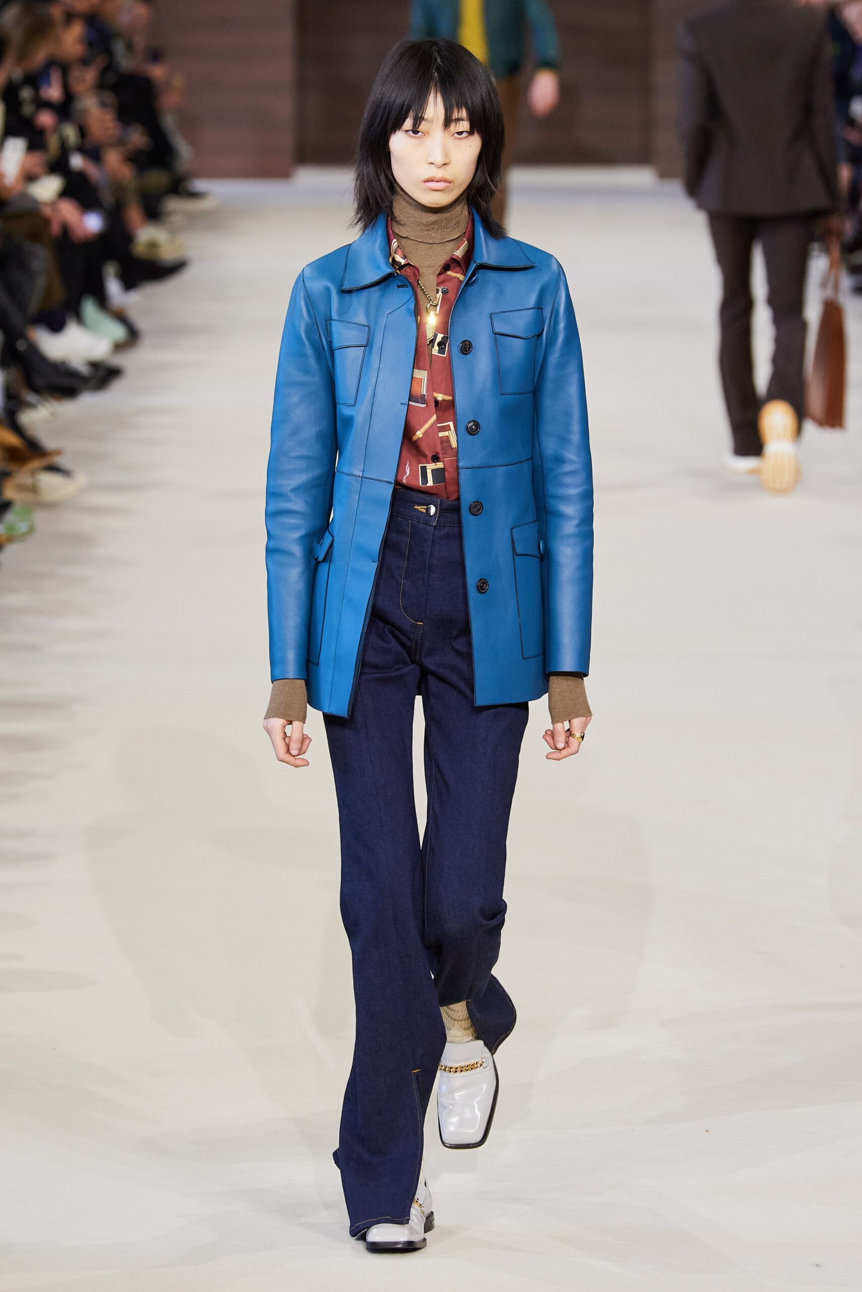 blue leather long-sleeve collared fitted buttoned jacket