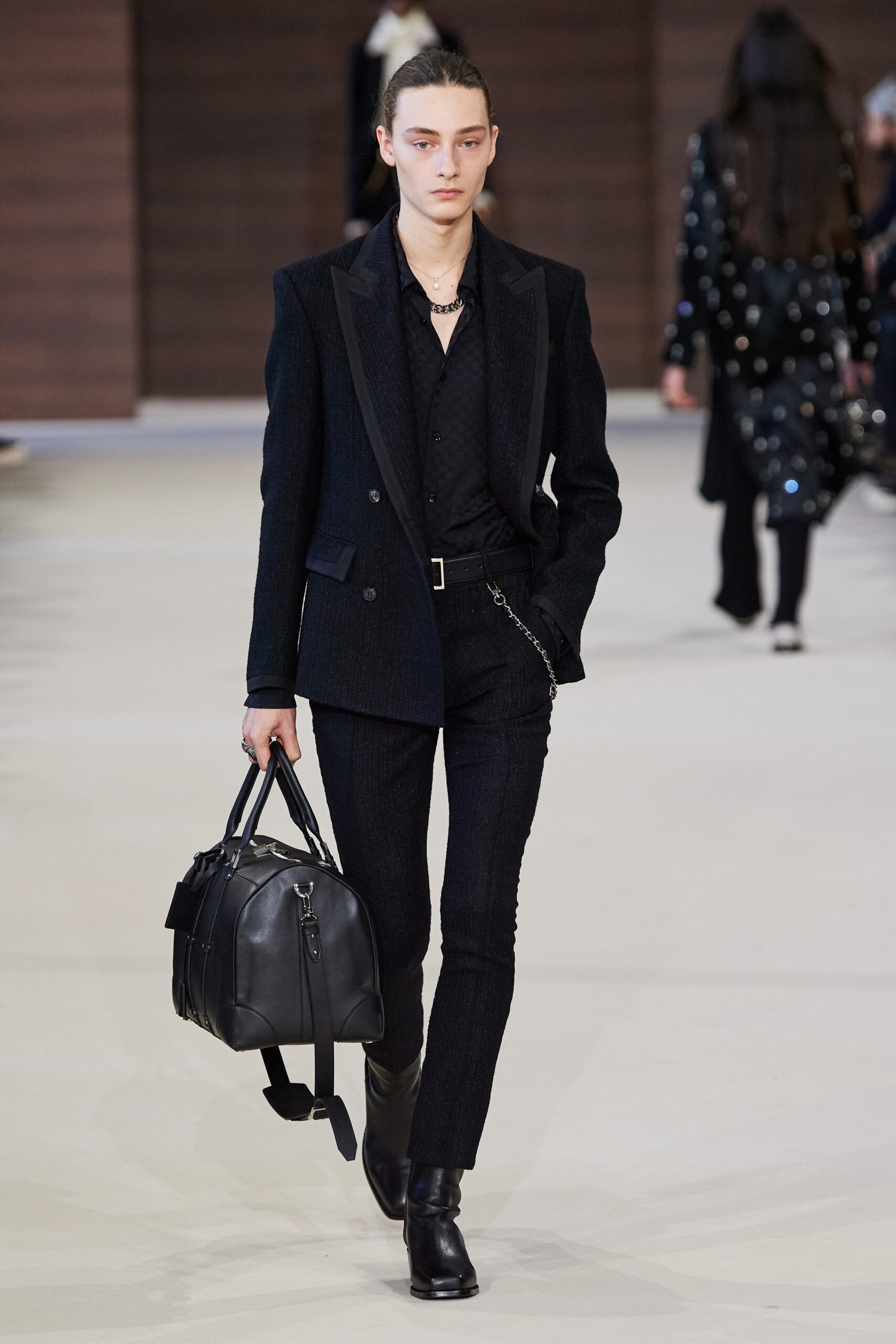 black wool long-sleeve collared tailored buttoned suit