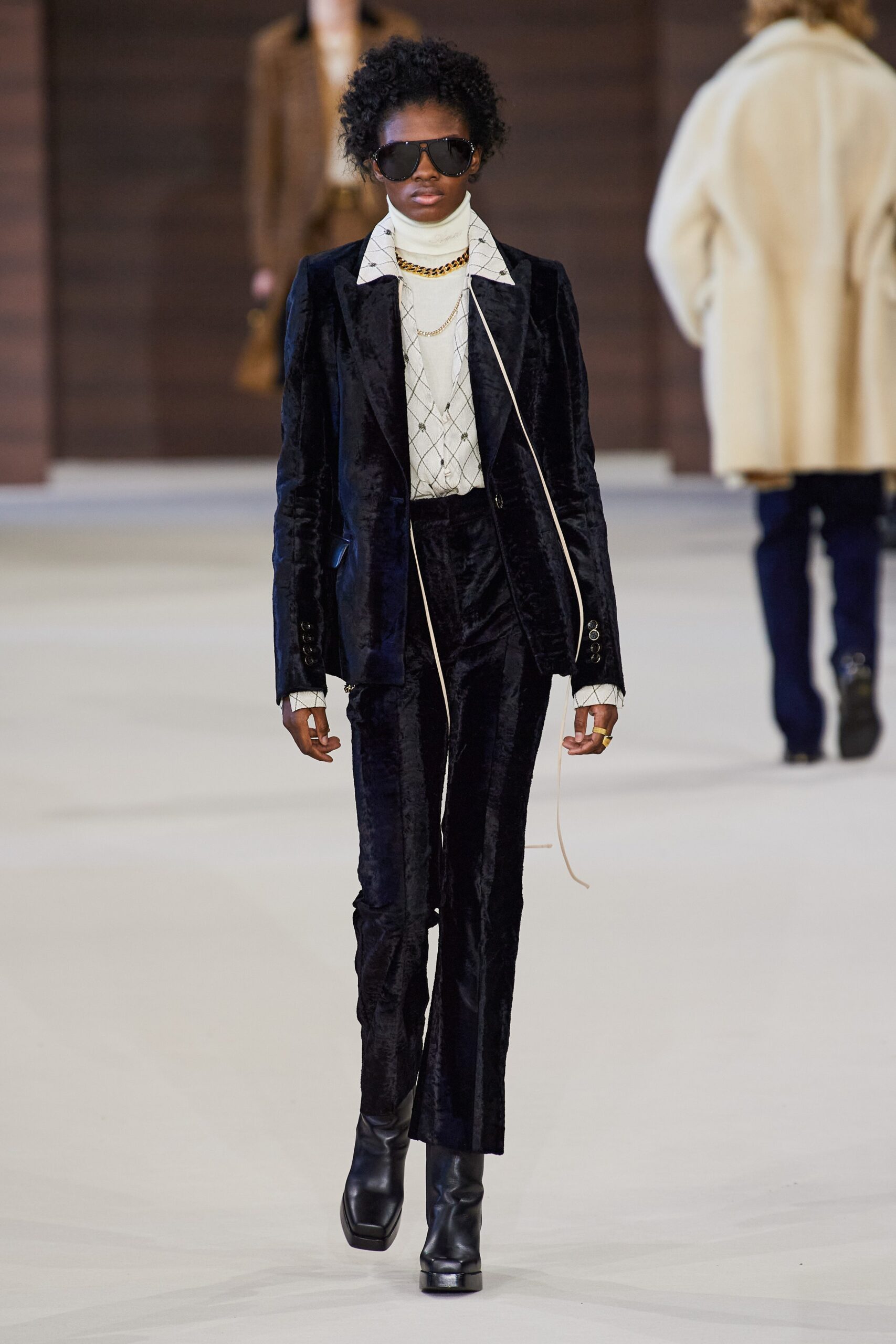 black velvet long-sleeve collared fitted buttoned suit