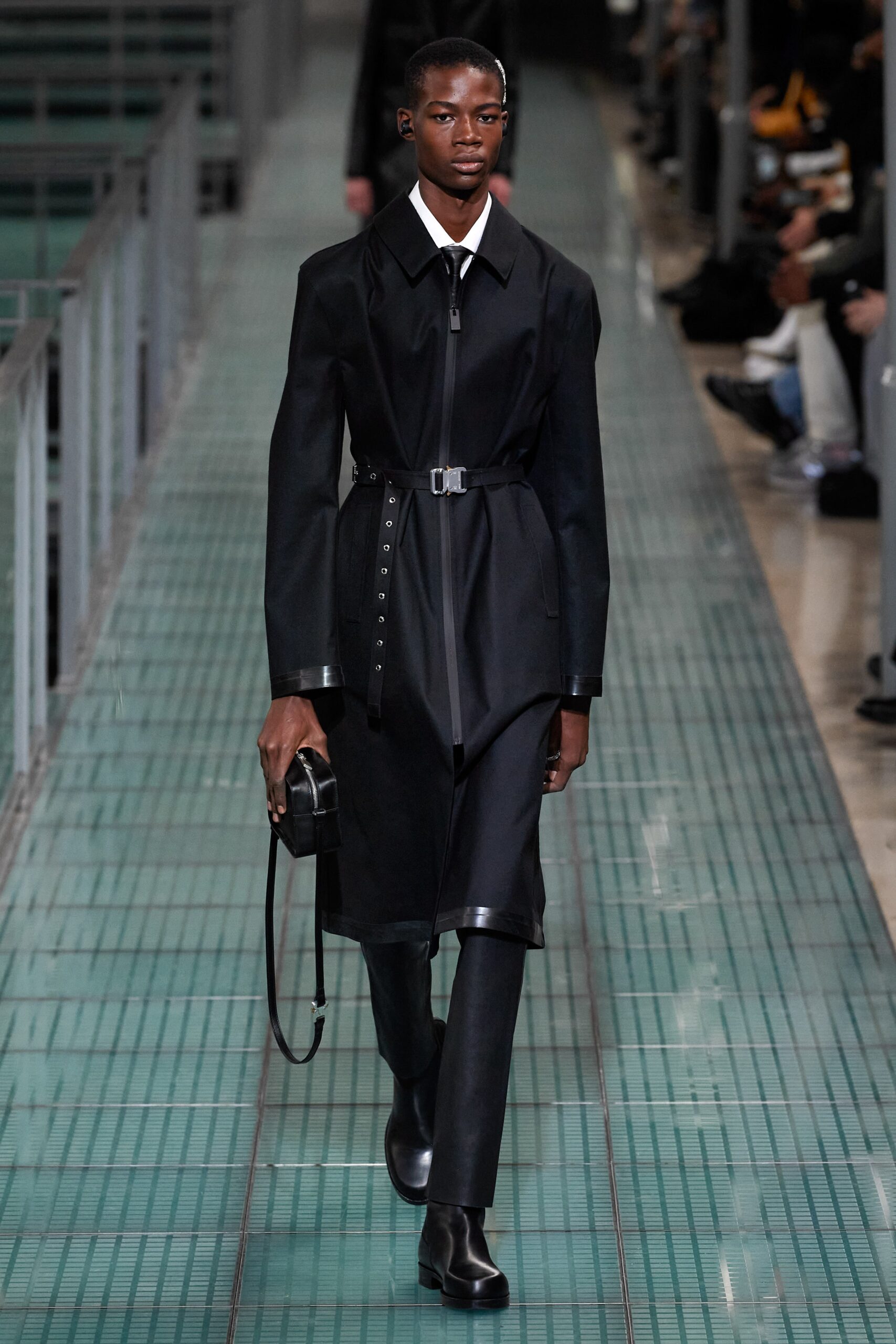 black fitted coat with slim pants