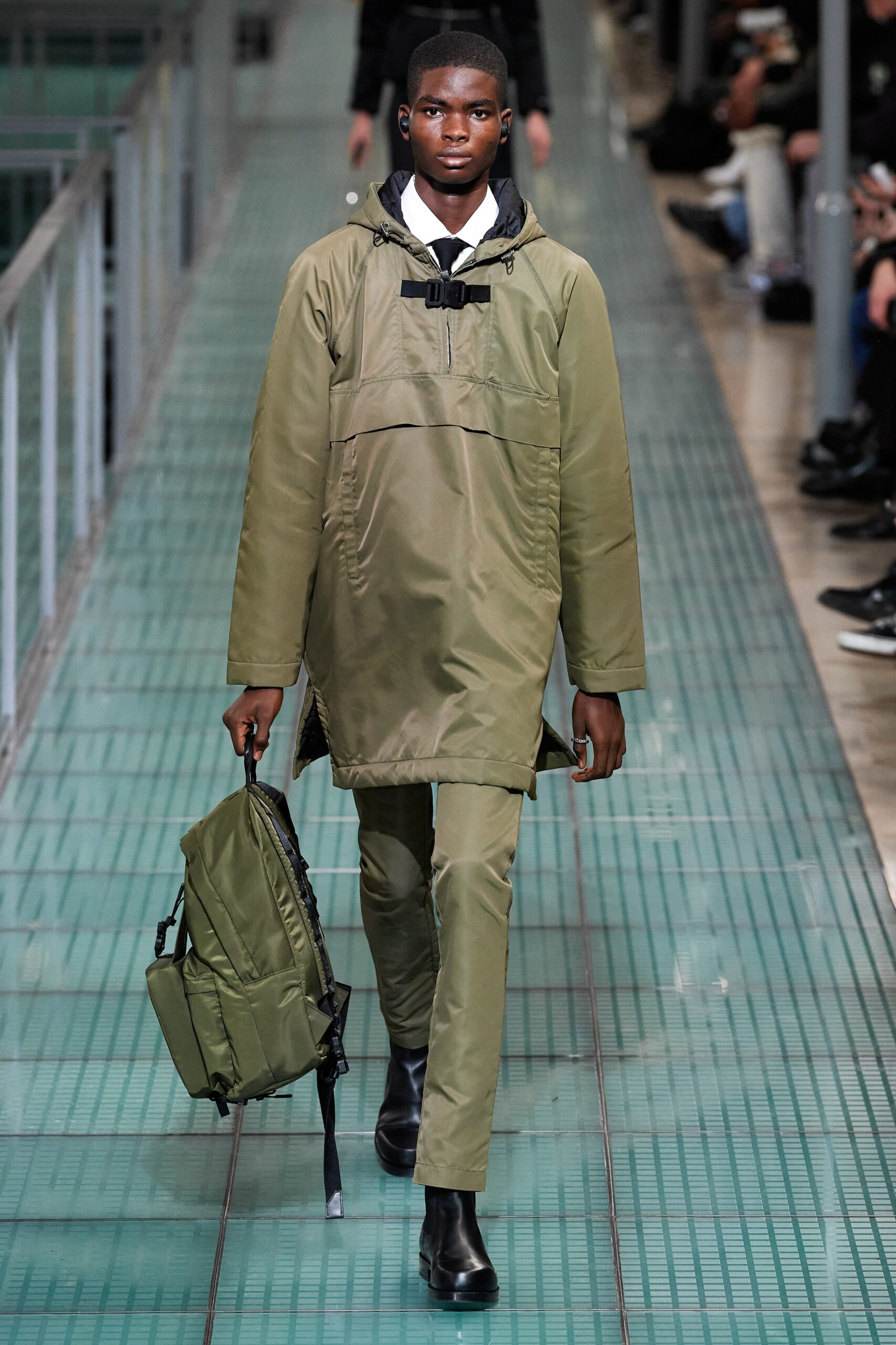 green relaxed coat with slim pants