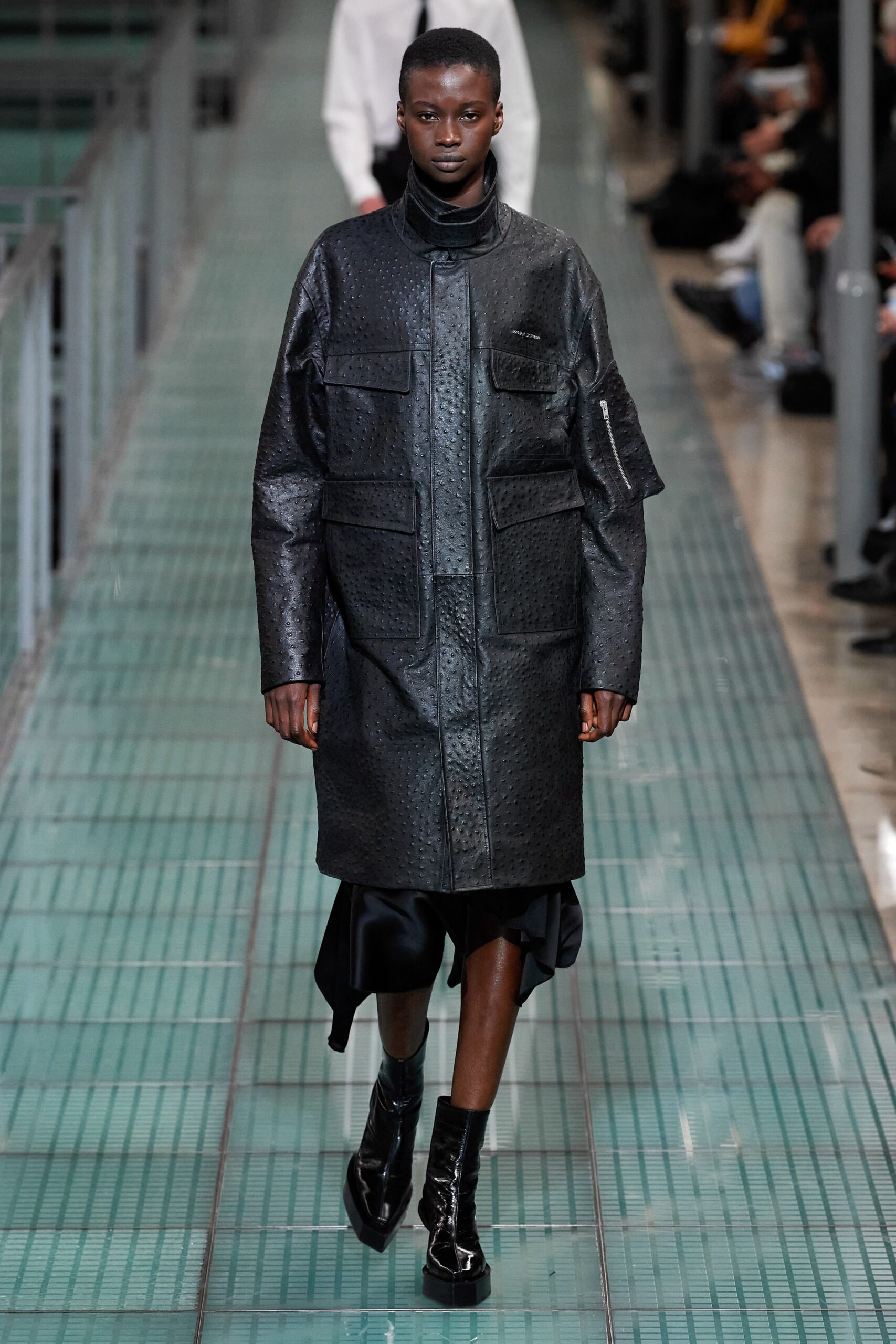 black leather oversized coat and black silk dress