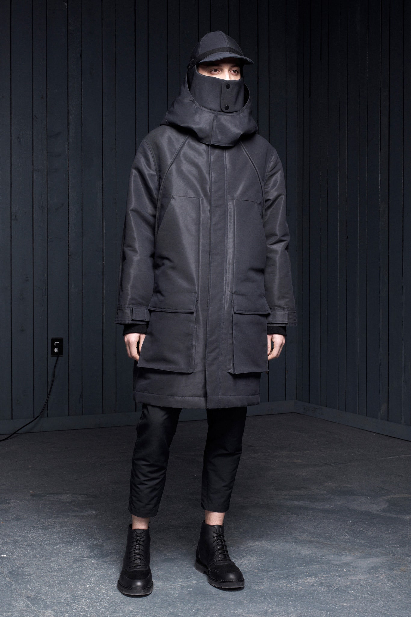 black vinyl coat with slim pants