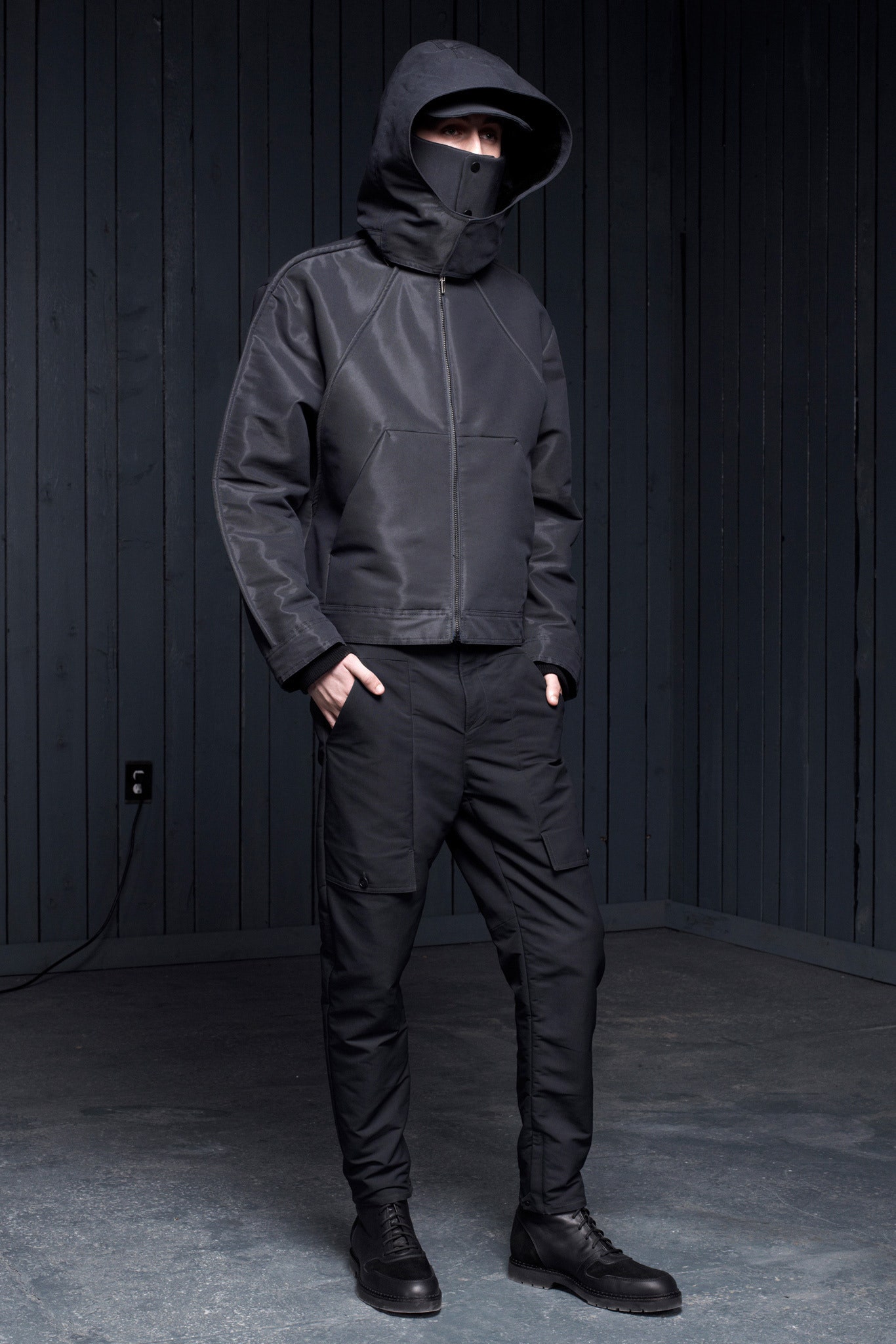 black vinyl jacket and pants
