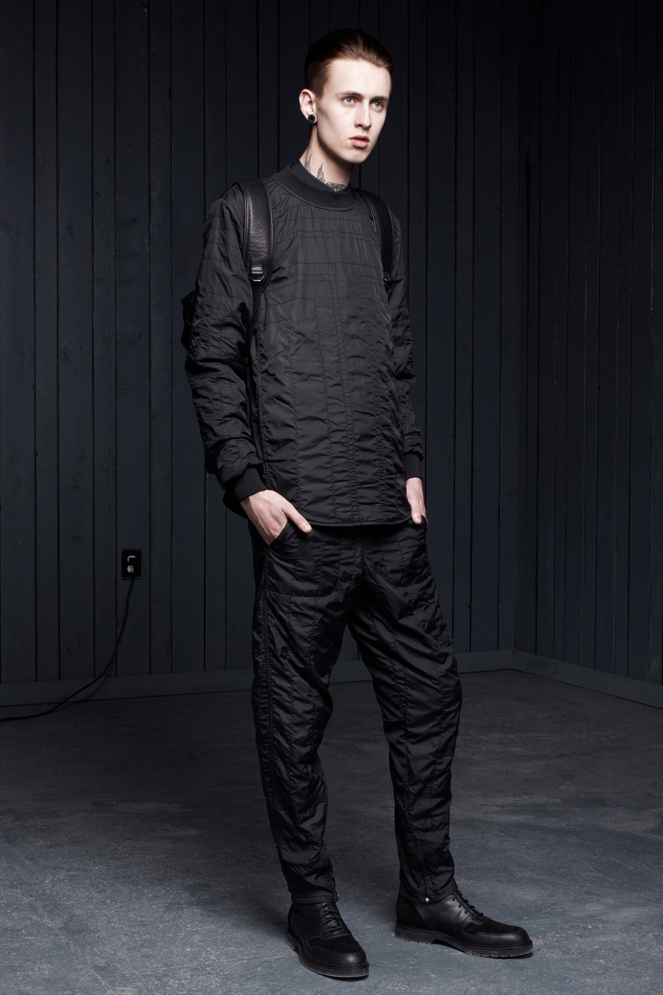 black relaxed quilted top and cargo pants