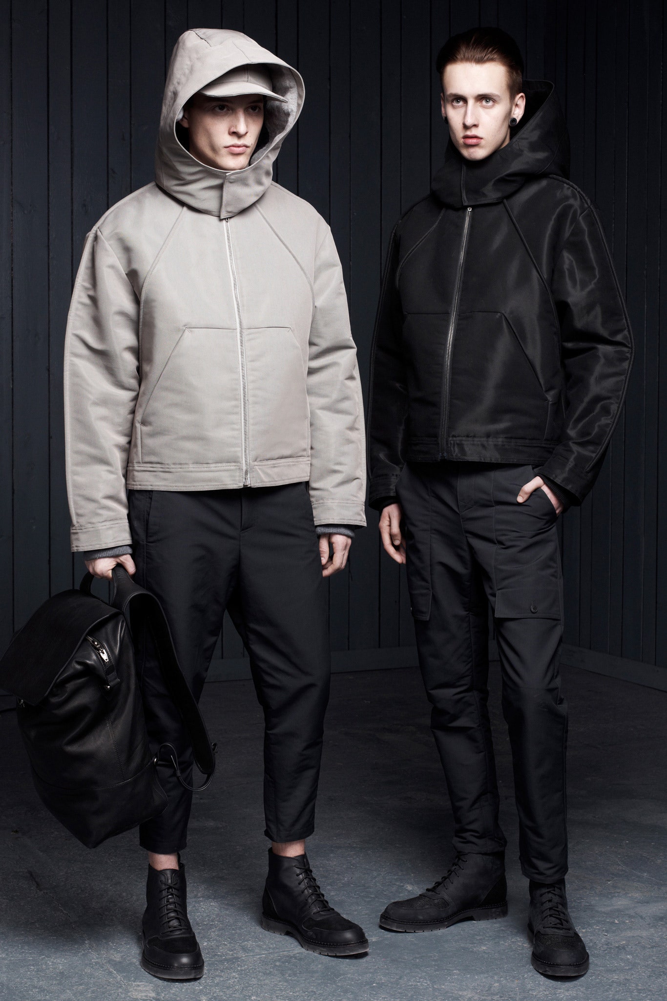 gray and black hooded jackets with slim pants